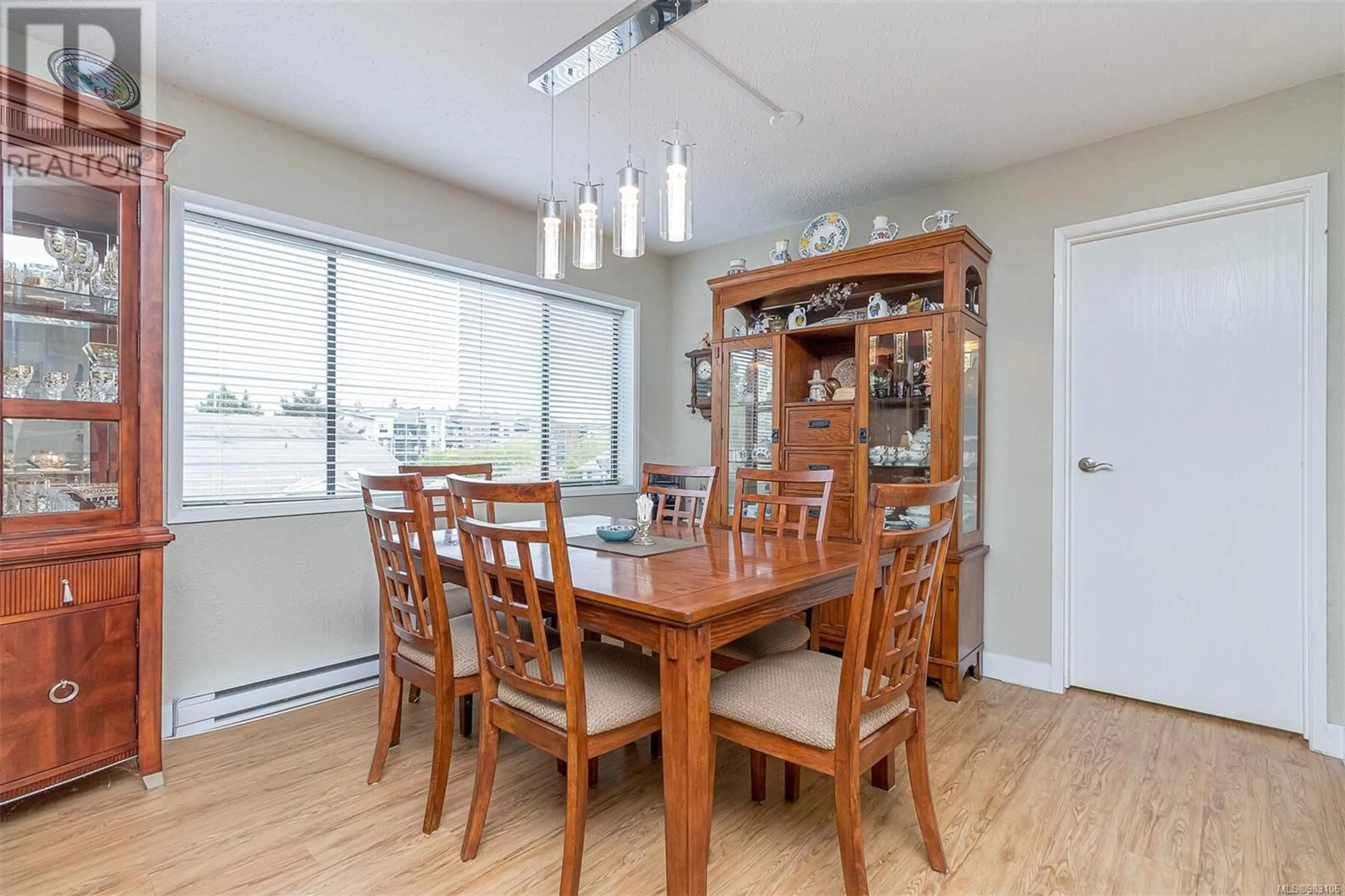 Dining room, wood/laminate floor for 303 363 Morison Ave, Parksville British Columbia V9P1P4