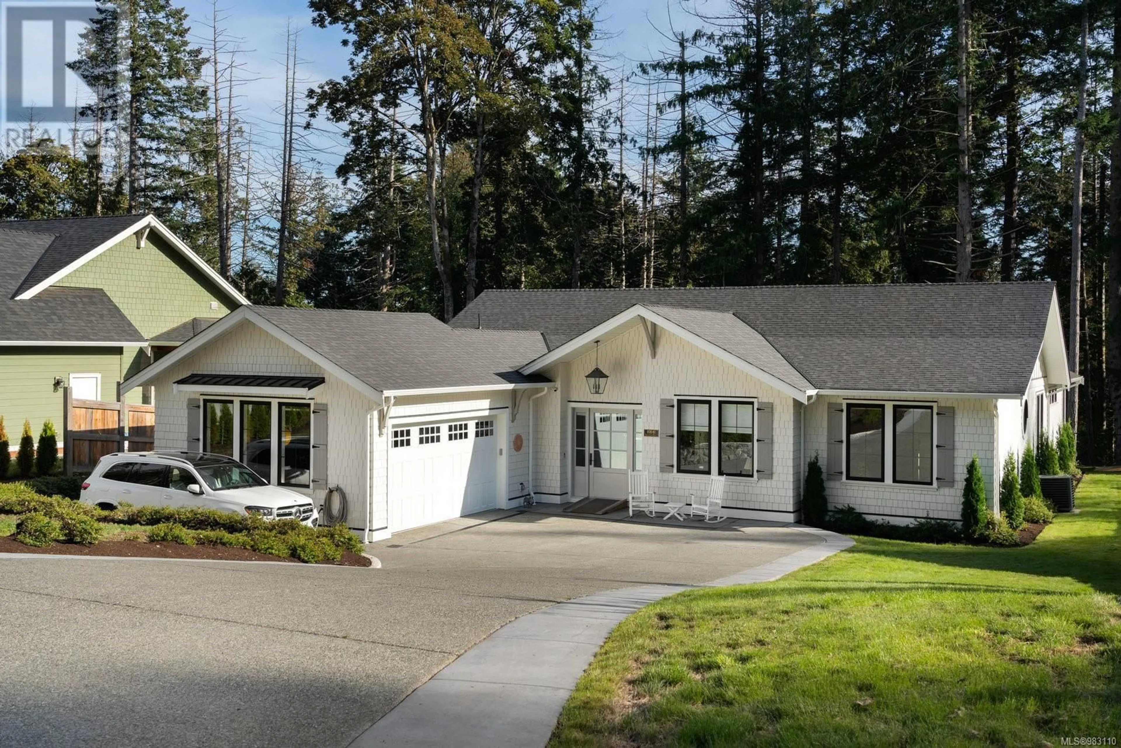 Home with vinyl exterior material, street for 10841 Greenpark Dr, North Saanich British Columbia V8L5N5