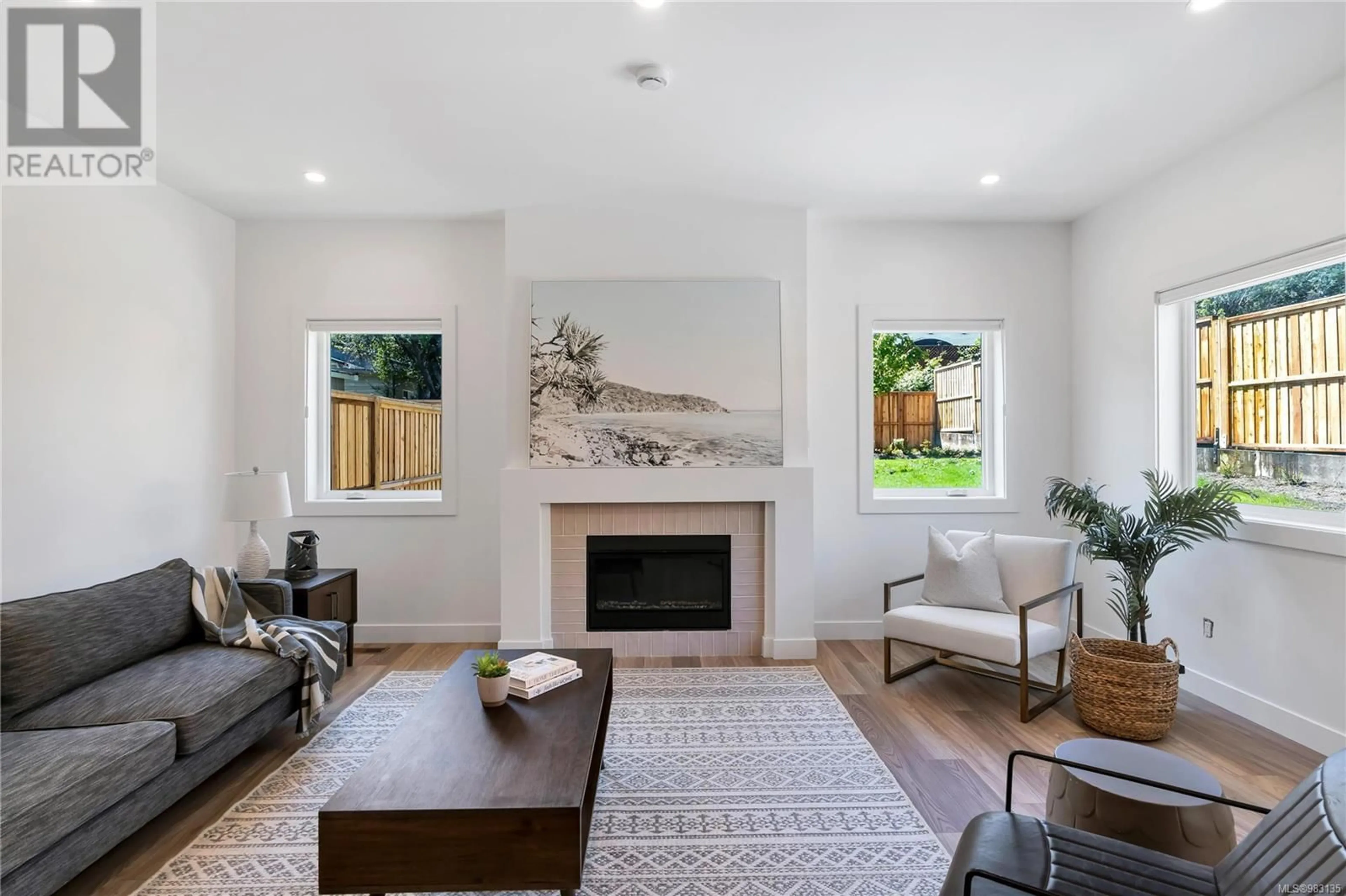 Living room with furniture, ceramic/tile floor for 1271 Dunsterville Ave, Saanich British Columbia V8Z2W9