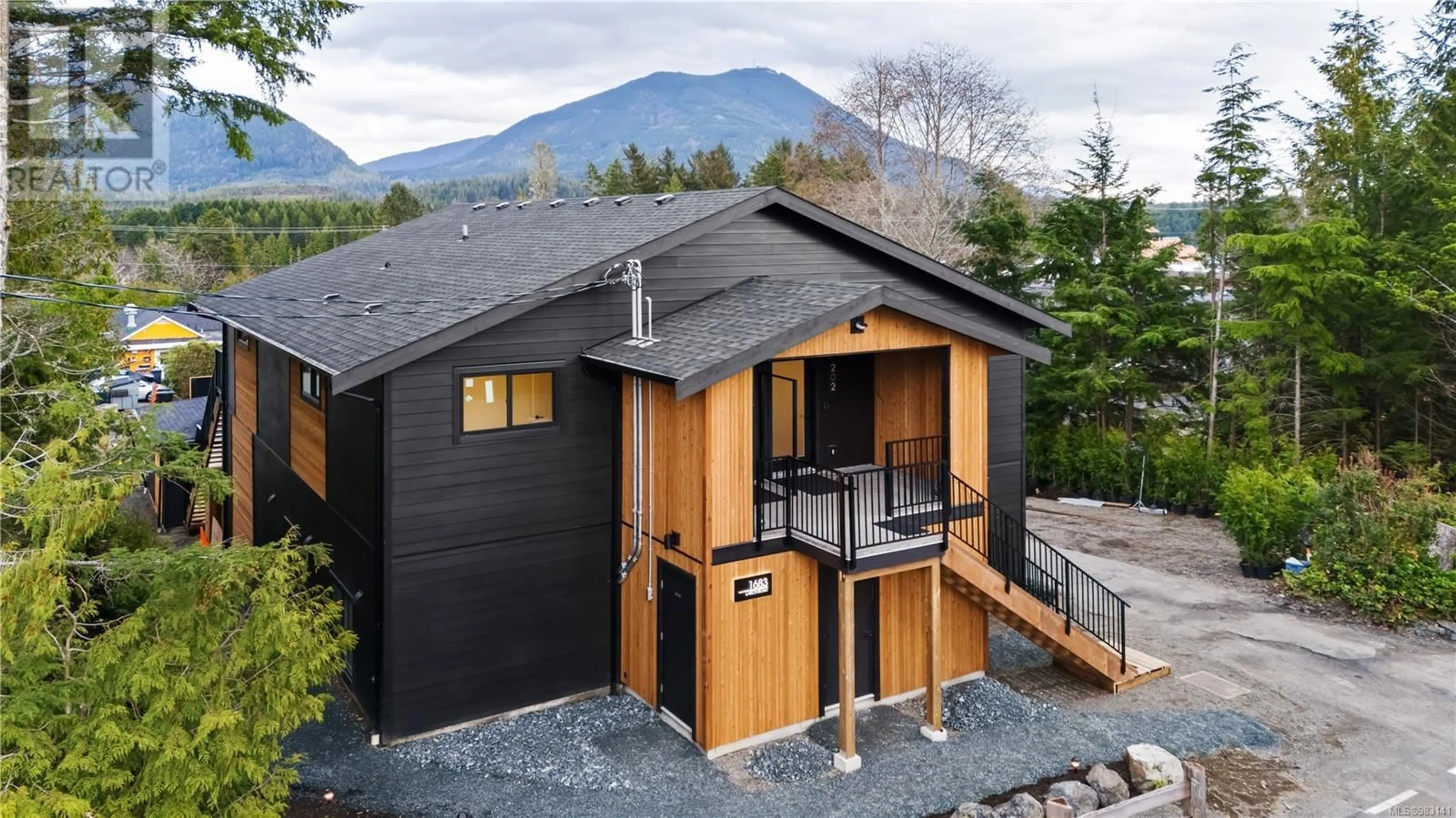 Home with vinyl exterior material, mountain view for 201 1683 Larch Rd, Ucluelet British Columbia V0R3A0