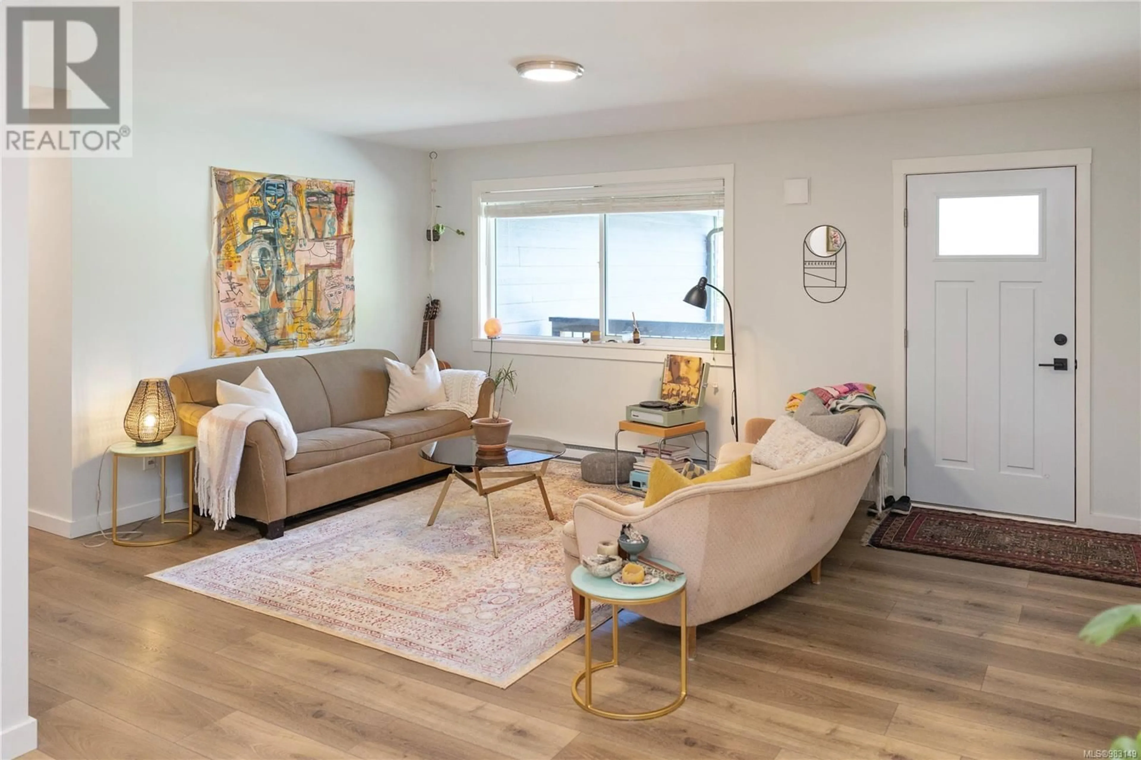 Living room with furniture, wood/laminate floor for 868 Elina Rd, Ucluelet British Columbia V0R3A0