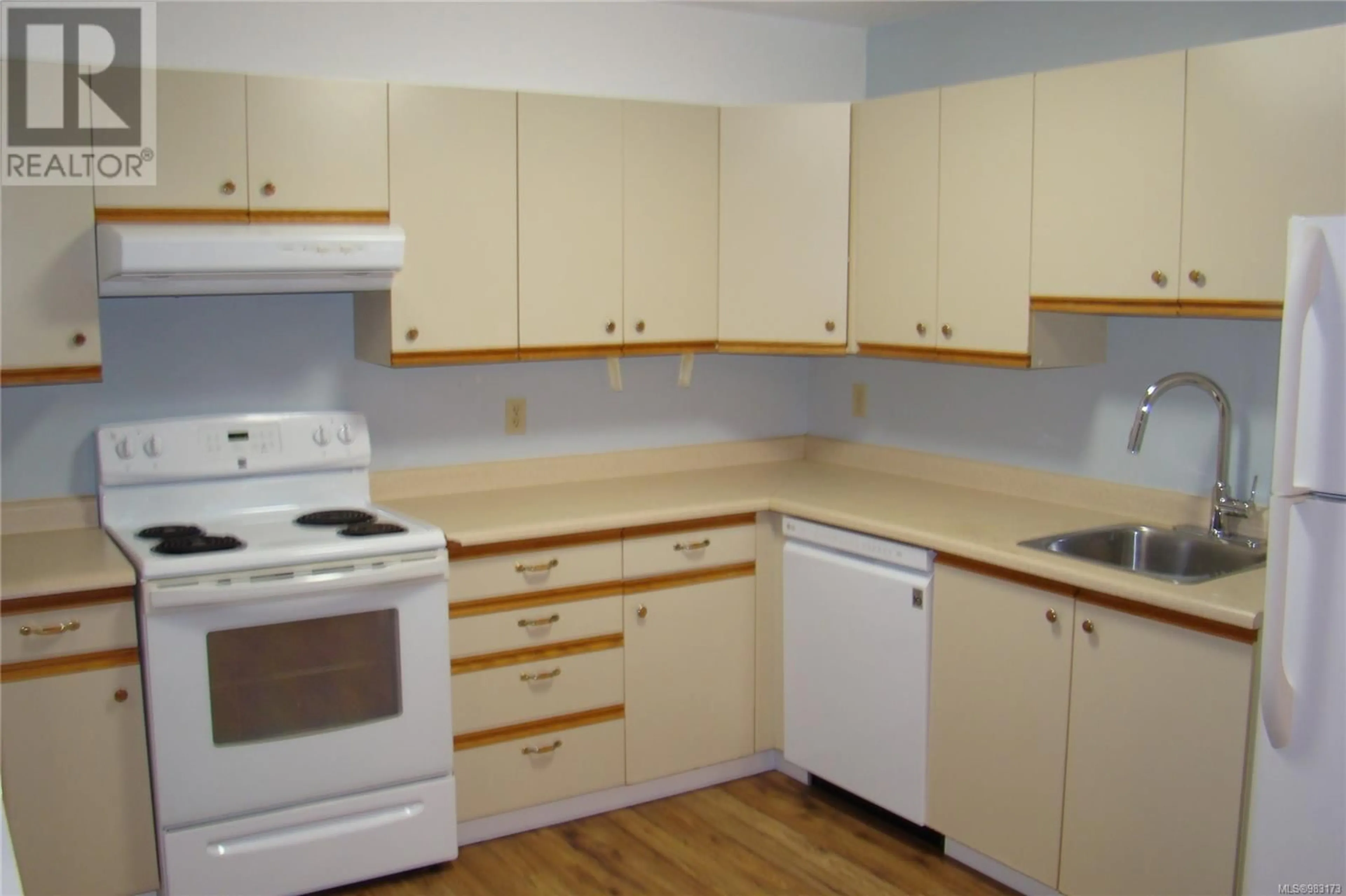 Standard kitchen, wood/laminate floor for 201 6715 Dover Rd, Nanaimo British Columbia V9V1L9