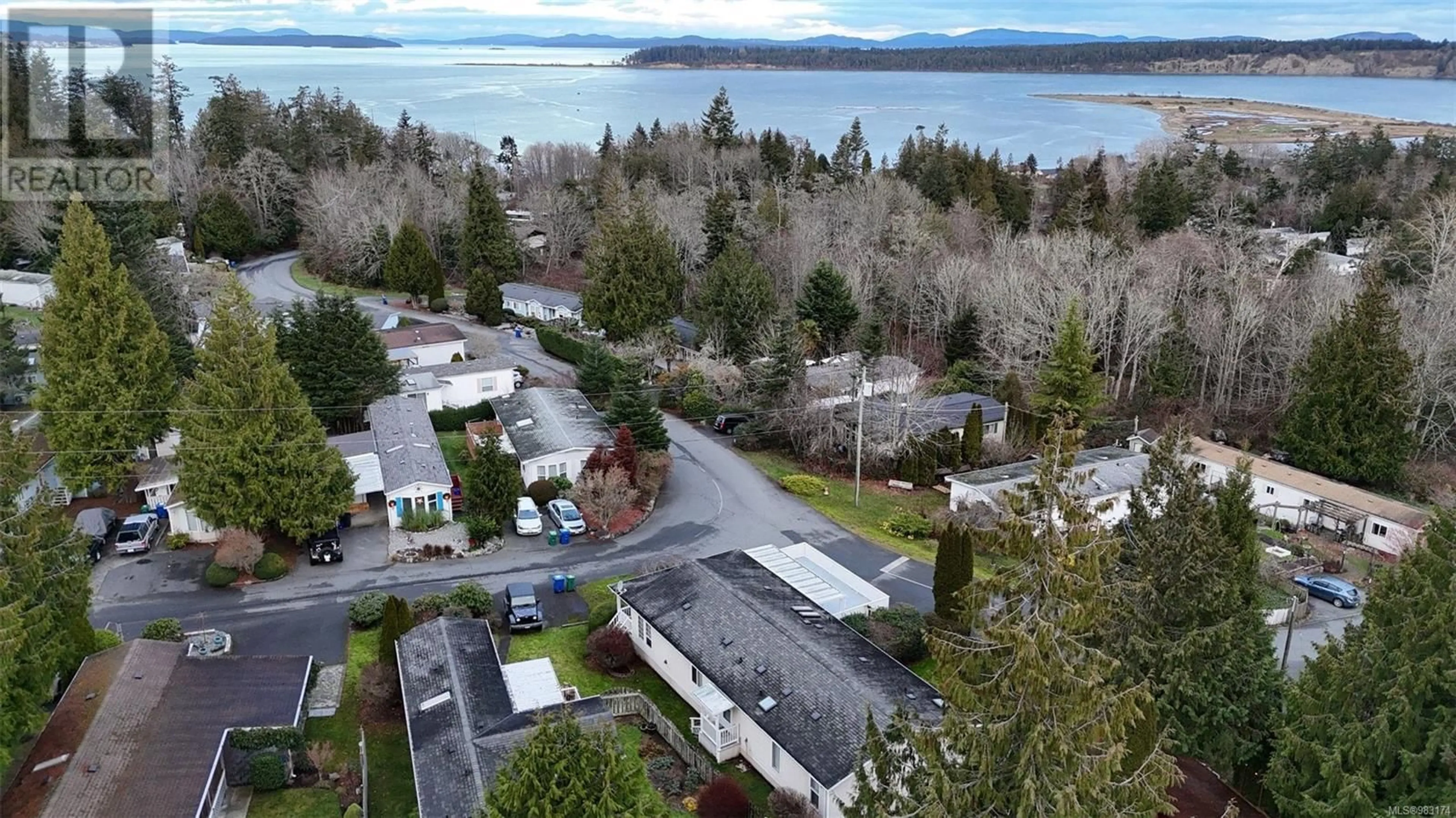 A pic from outside/outdoor area/front of a property/back of a property/a pic from drone, water/lake/river/ocean view for 113 2779 Stautw Rd, Central Saanich British Columbia V8M2C8