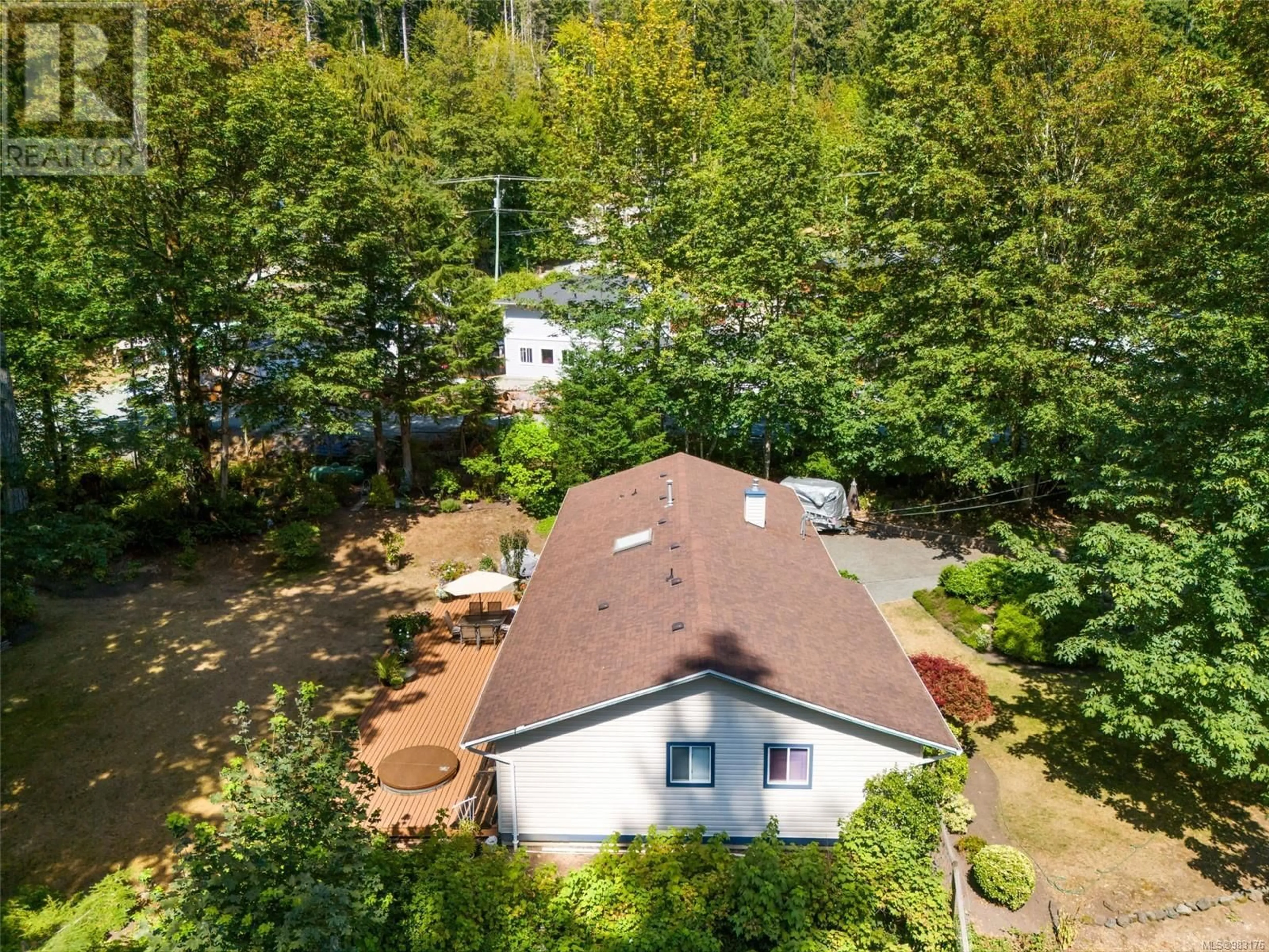 A pic from outside/outdoor area/front of a property/back of a property/a pic from drone, forest/trees view for 8130 Miracle Close, Youbou British Columbia V0R3E1