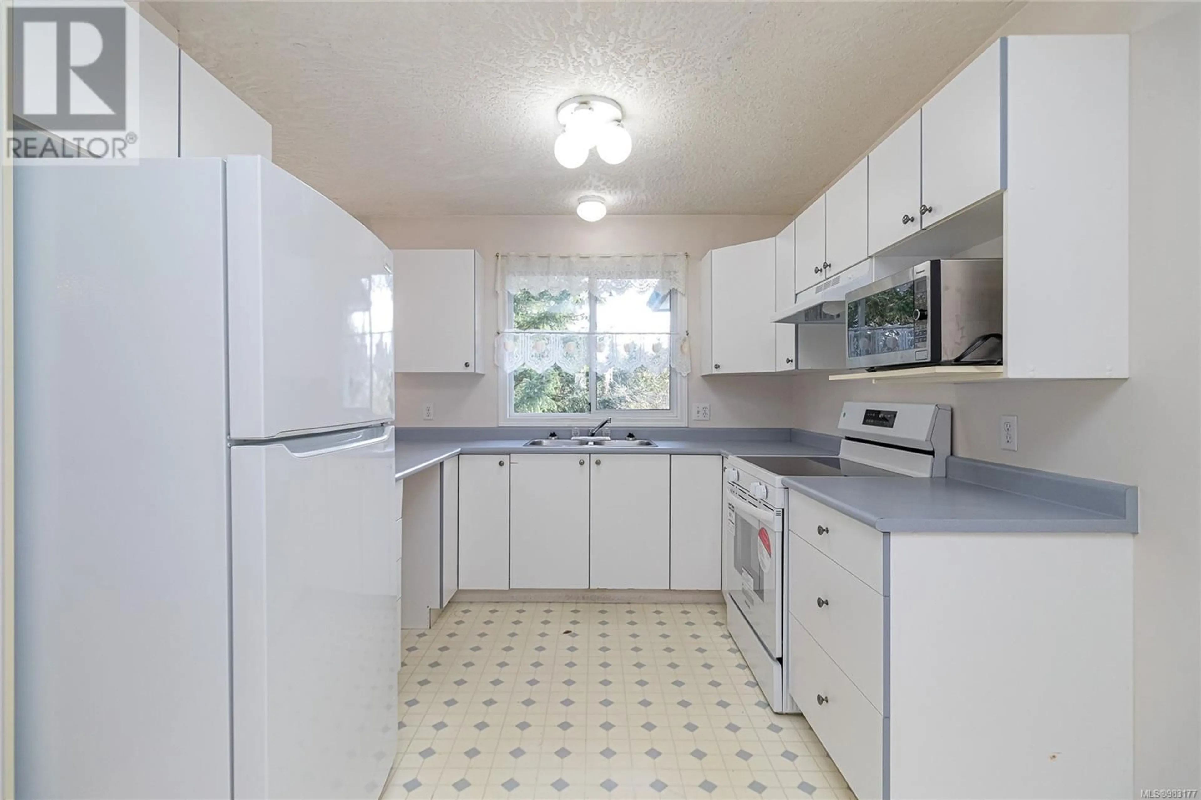 Standard kitchen, ceramic/tile floor for 6781 Rhodonite Dr, Sooke British Columbia V9Z0H5