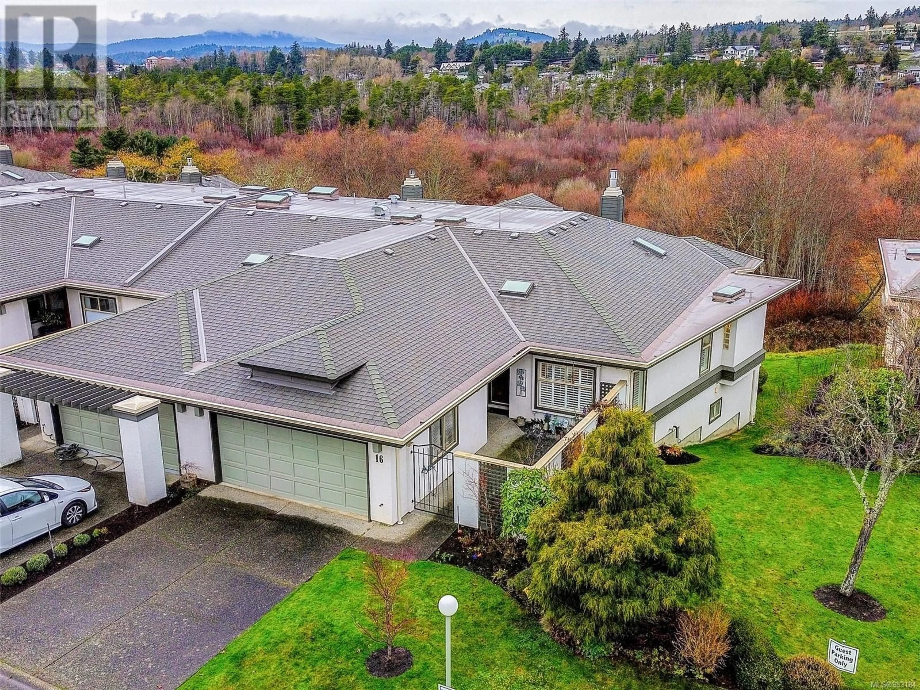 A pic from outside/outdoor area/front of a property/back of a property/a pic from drone, mountain view for 16 4360 Emily Carr Dr, Saanich British Columbia V8X4Y4