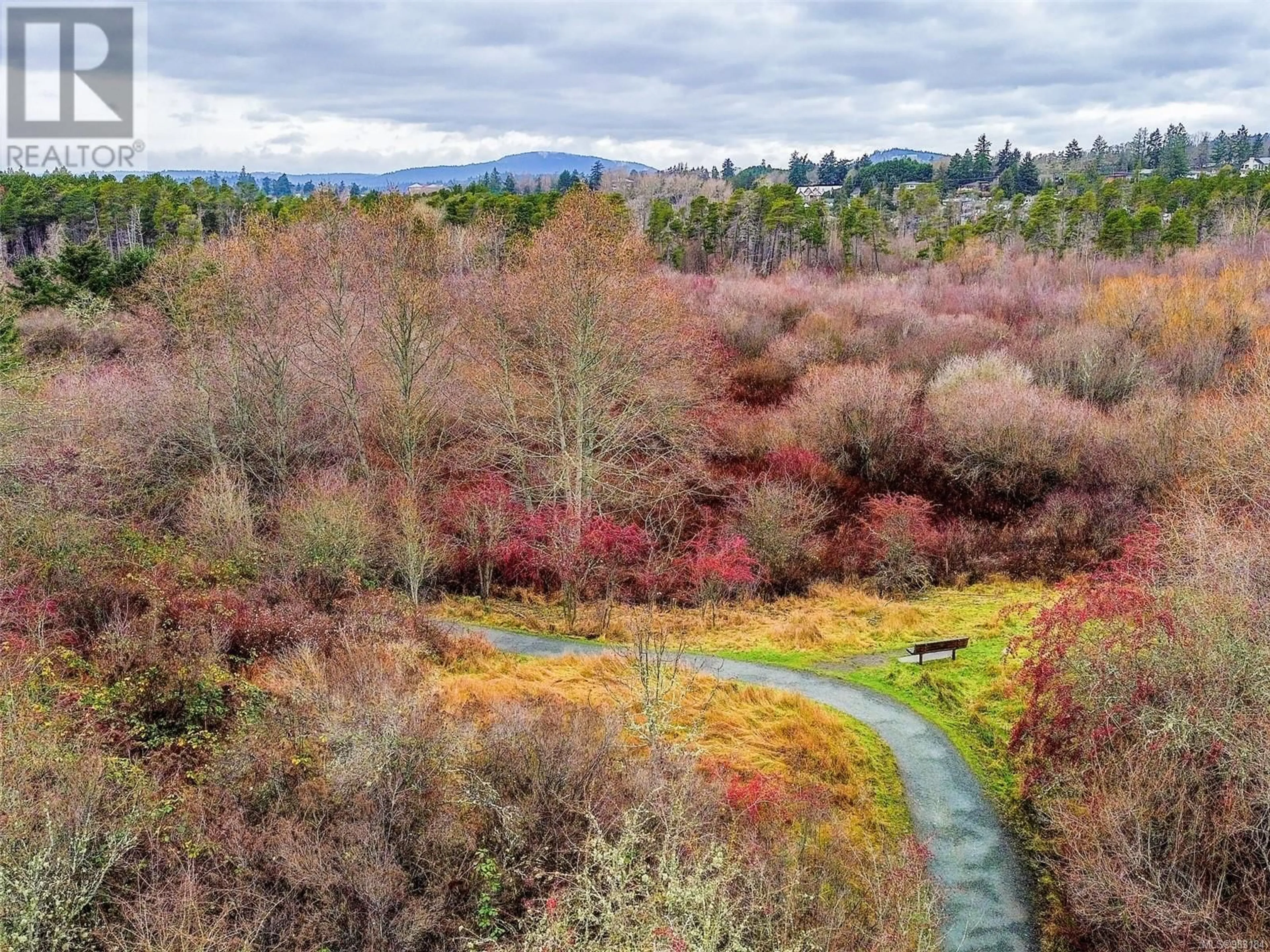 A pic from outside/outdoor area/front of a property/back of a property/a pic from drone, forest/trees view for 16 4360 Emily Carr Dr, Saanich British Columbia V8X4Y4