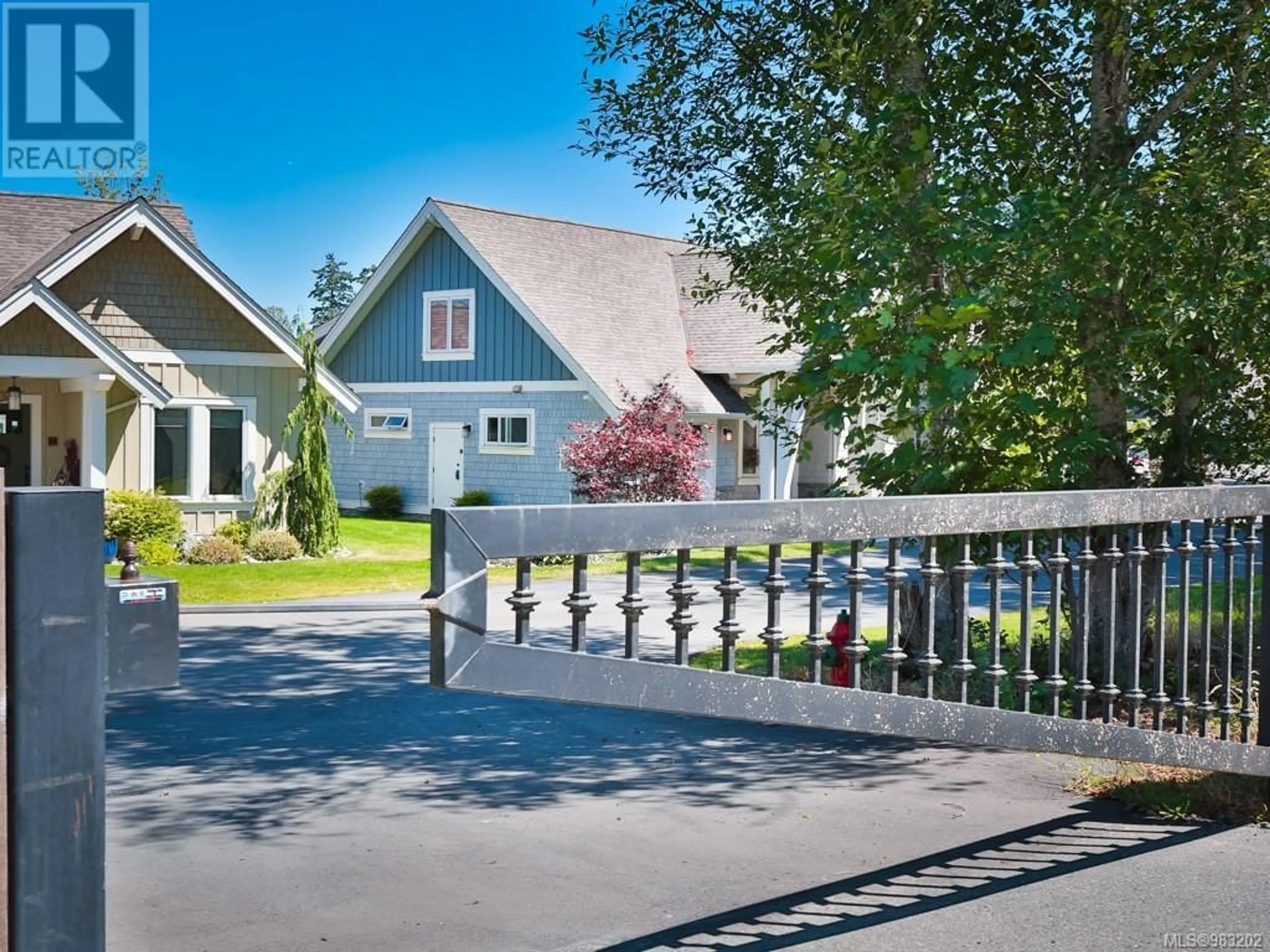 Home with vinyl exterior material, street for 15 5251 Island Hwy W, Qualicum Beach British Columbia V9K2C1