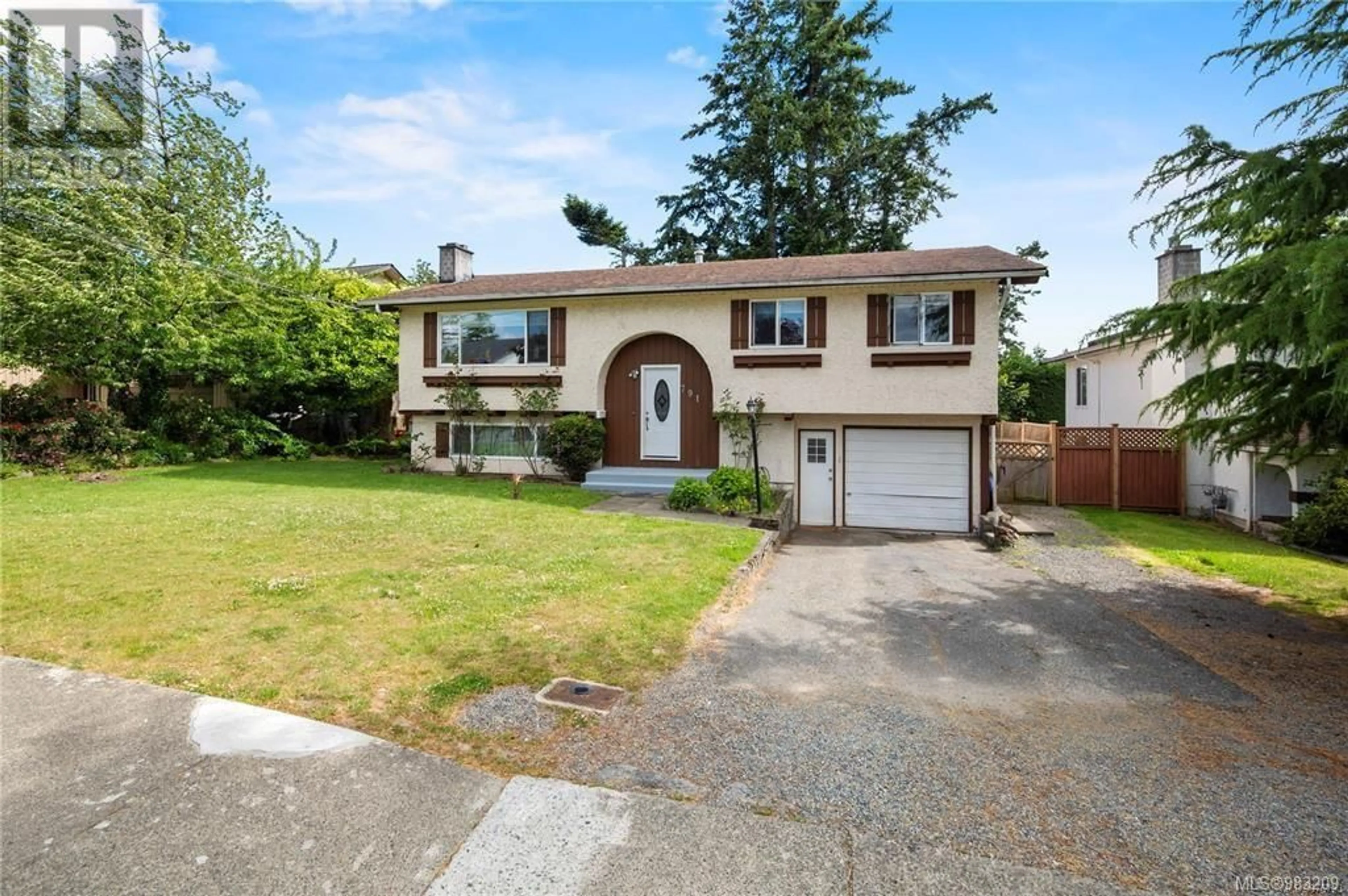 Home with vinyl exterior material, street for 791 Mann Ave, Saanich British Columbia V8Z6B2