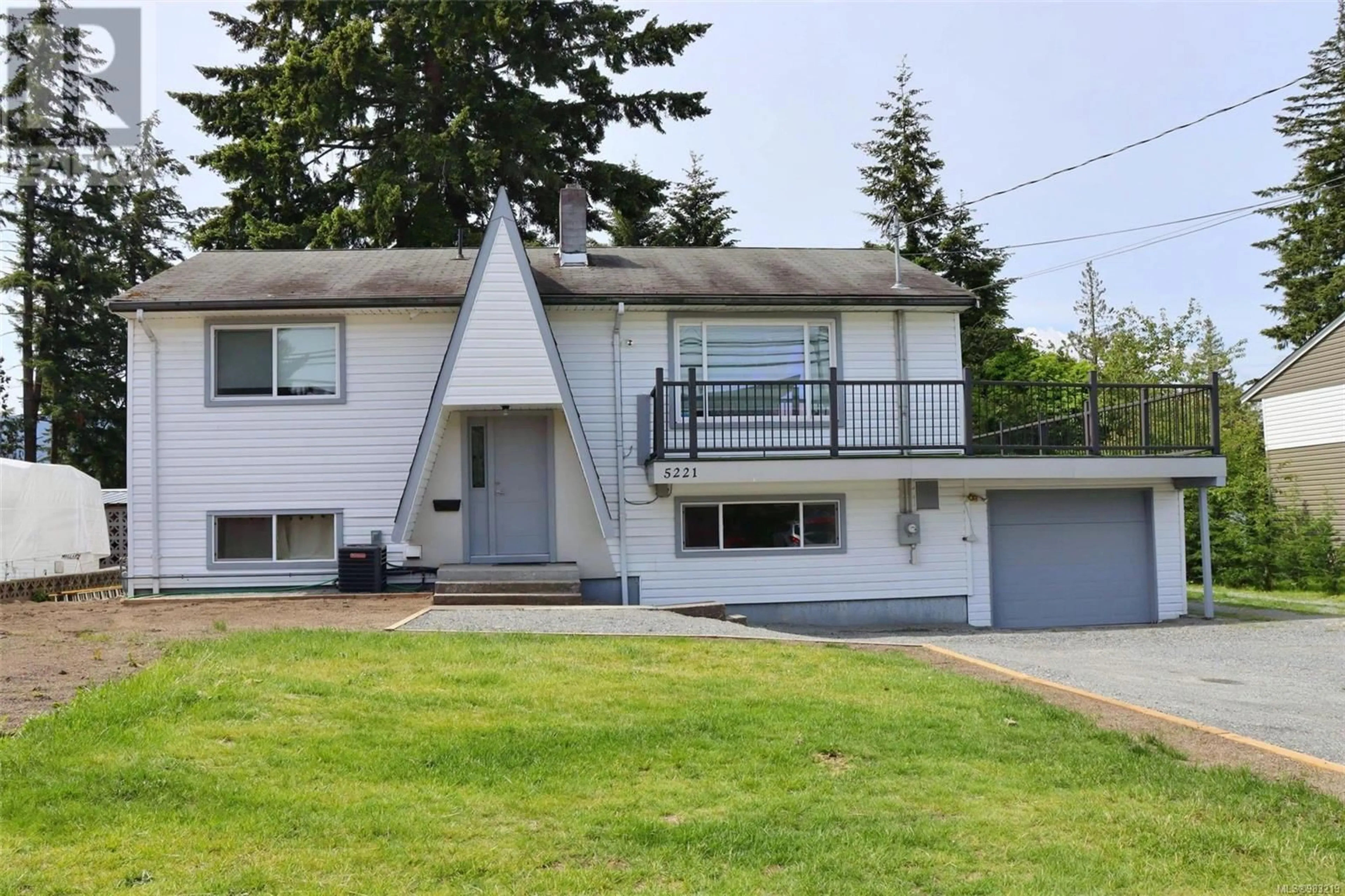 Home with vinyl exterior material, street for 5221 Metral Dr, Nanaimo British Columbia V9T2K7