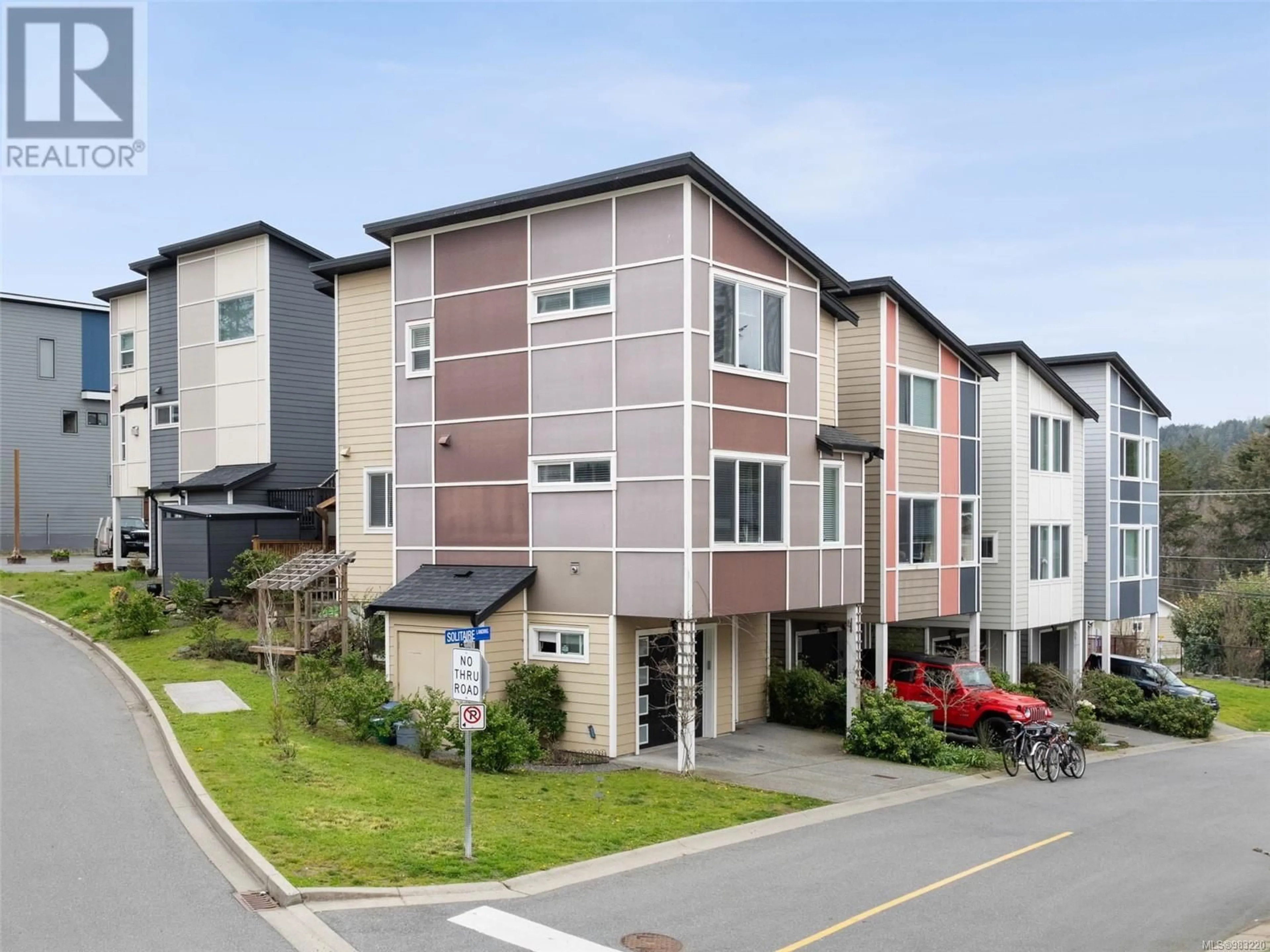 A pic from outside/outdoor area/front of a property/back of a property/a pic from drone, street for 943 Solitaire Landing, Langford British Columbia V9C2W3