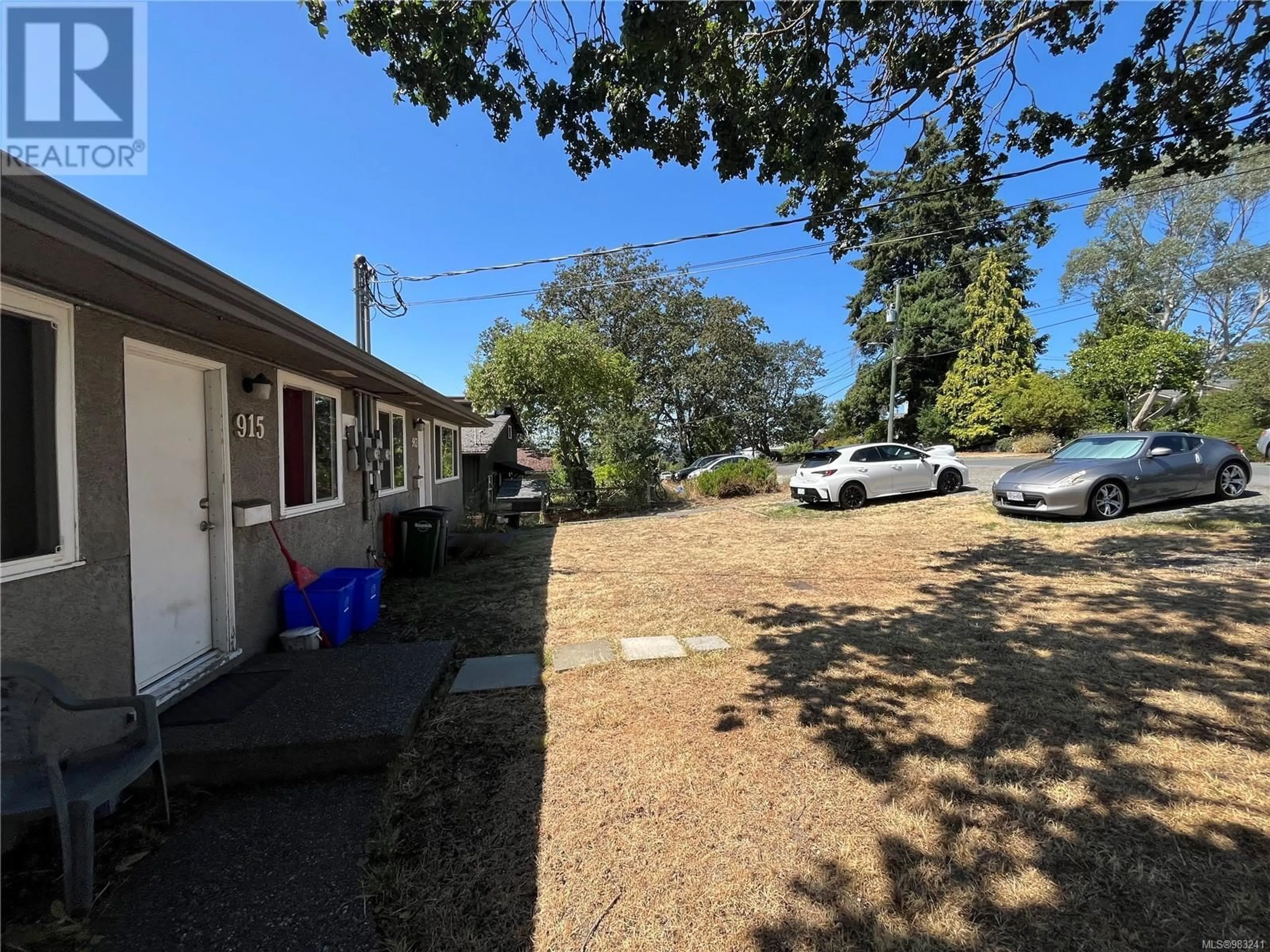 A pic from outside/outdoor area/front of a property/back of a property/a pic from drone, street for 913 Falmouth Rd, Saanich British Columbia V8X3A3