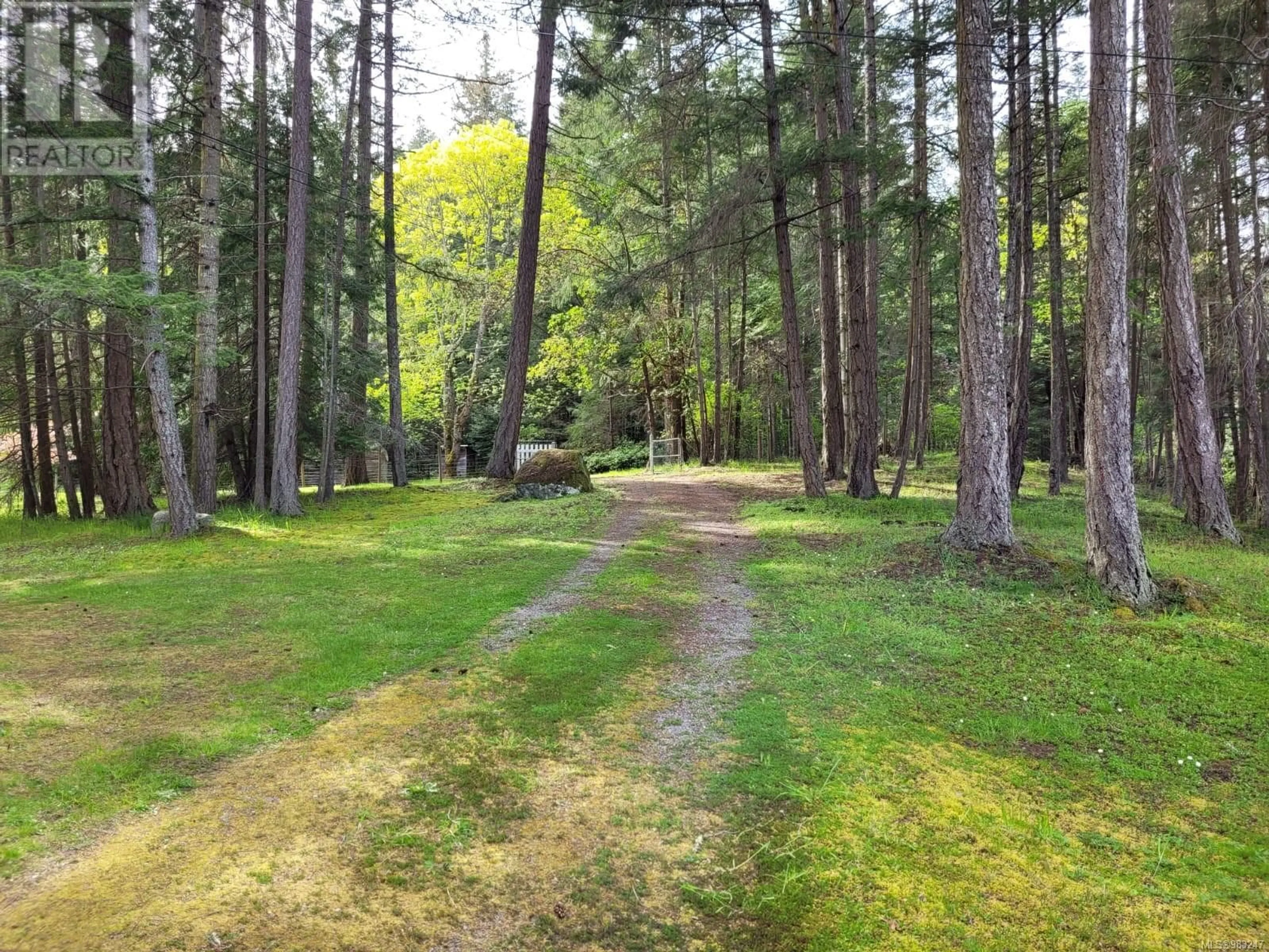 A pic from outside/outdoor area/front of a property/back of a property/a pic from drone, forest/trees view for 4218 Armadale Rd, Pender Island British Columbia V0N2M1