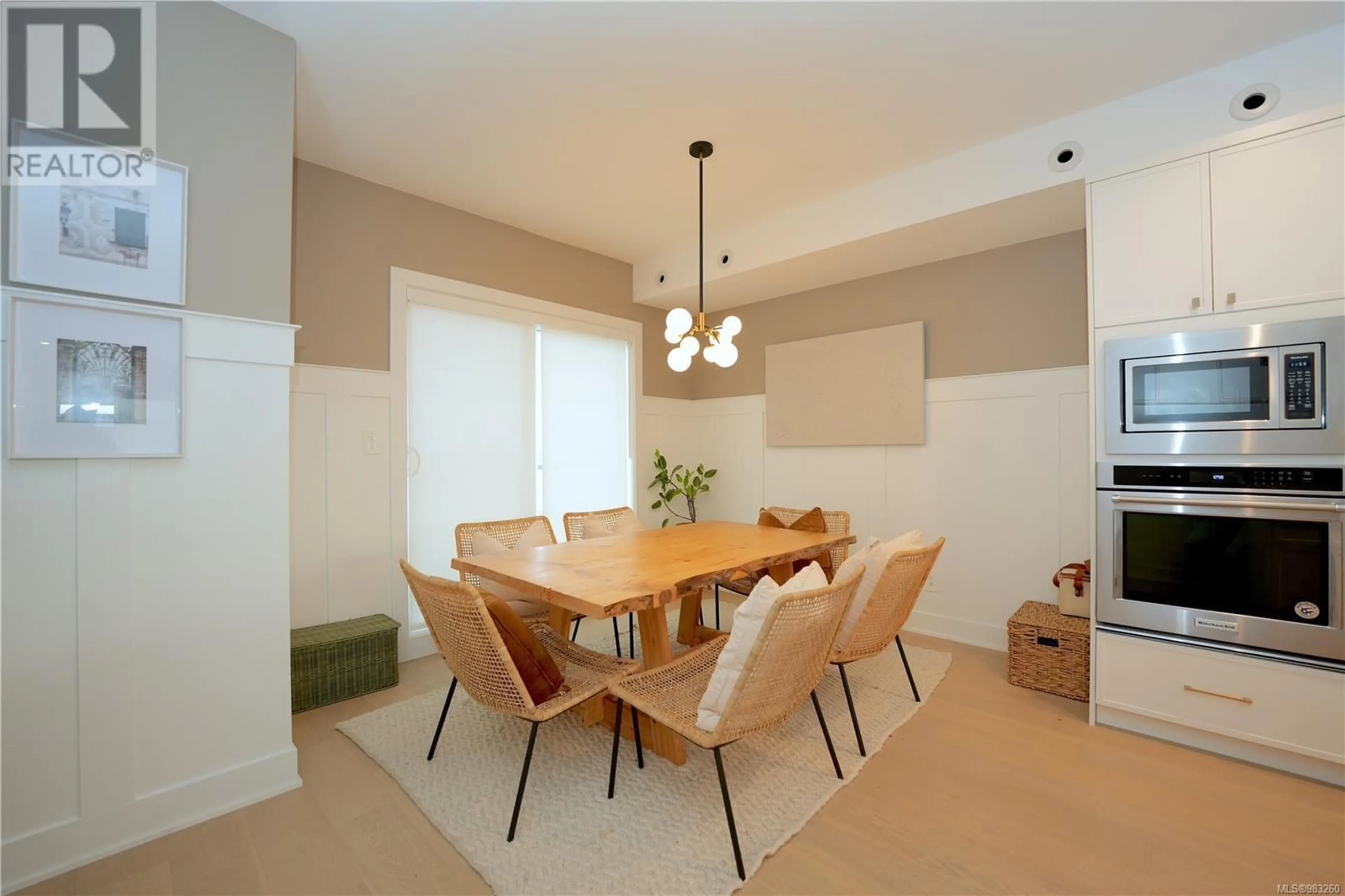 Dining room, wood/laminate floor for 1166 Olivine Mews, Langford British Columbia V9B5P9