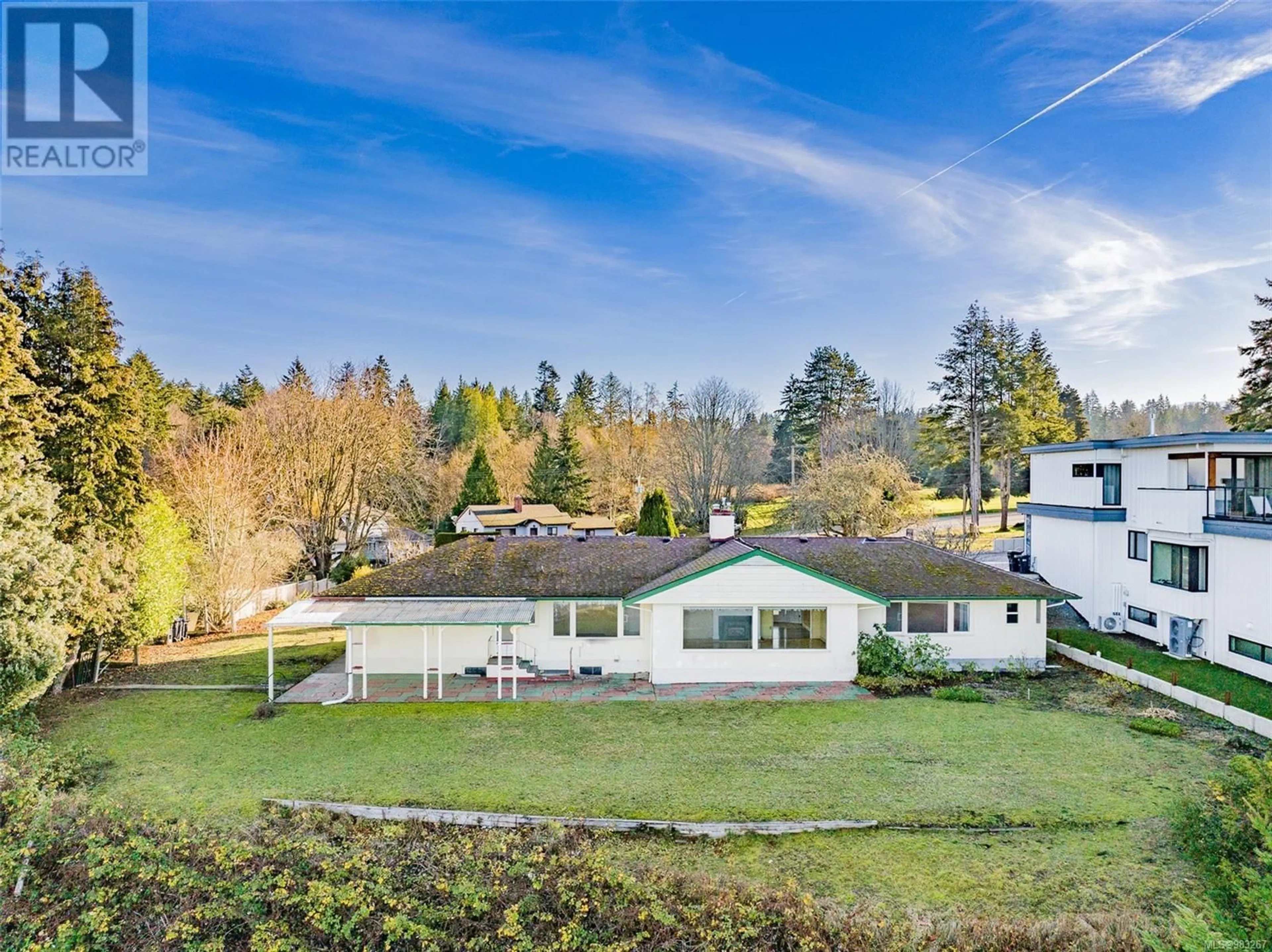 A pic from outside/outdoor area/front of a property/back of a property/a pic from drone, unknown for 441 MEMORIAL AVENUE, Qualicum Beach British Columbia V9K1G8