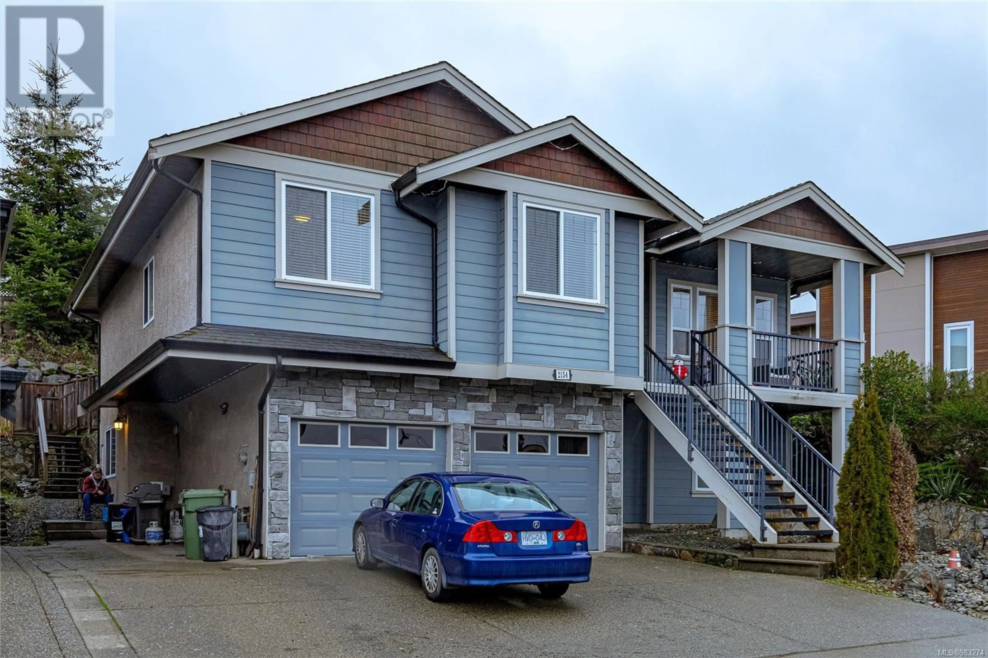 Home with vinyl exterior material, street for 2154 Kingbird Dr, Langford British Columbia V9B6V7