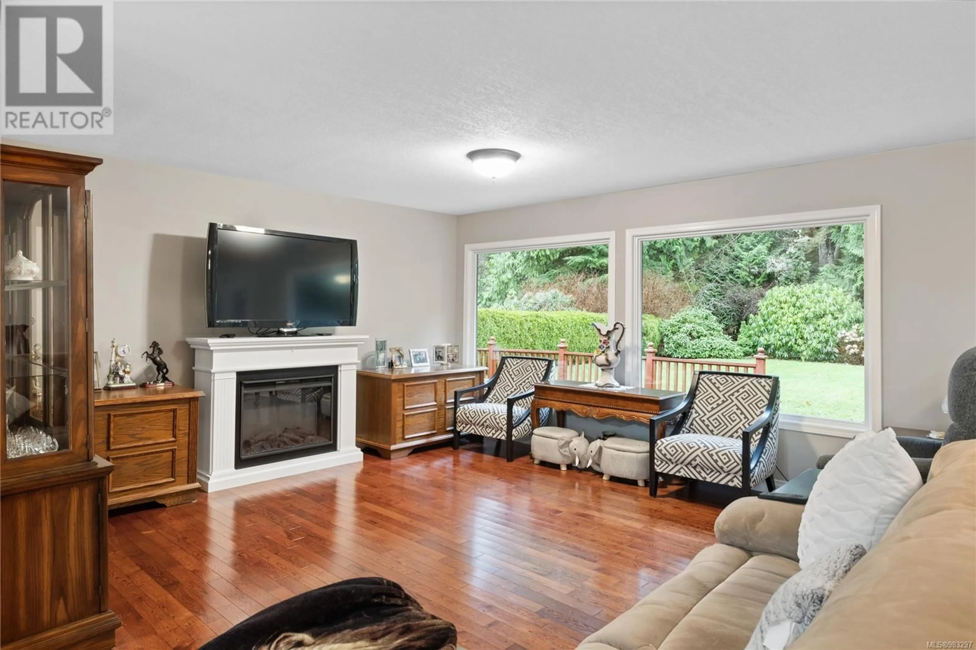 Living room with furniture, unknown for 1310 Lanyon Dr, French Creek British Columbia V9P1W6