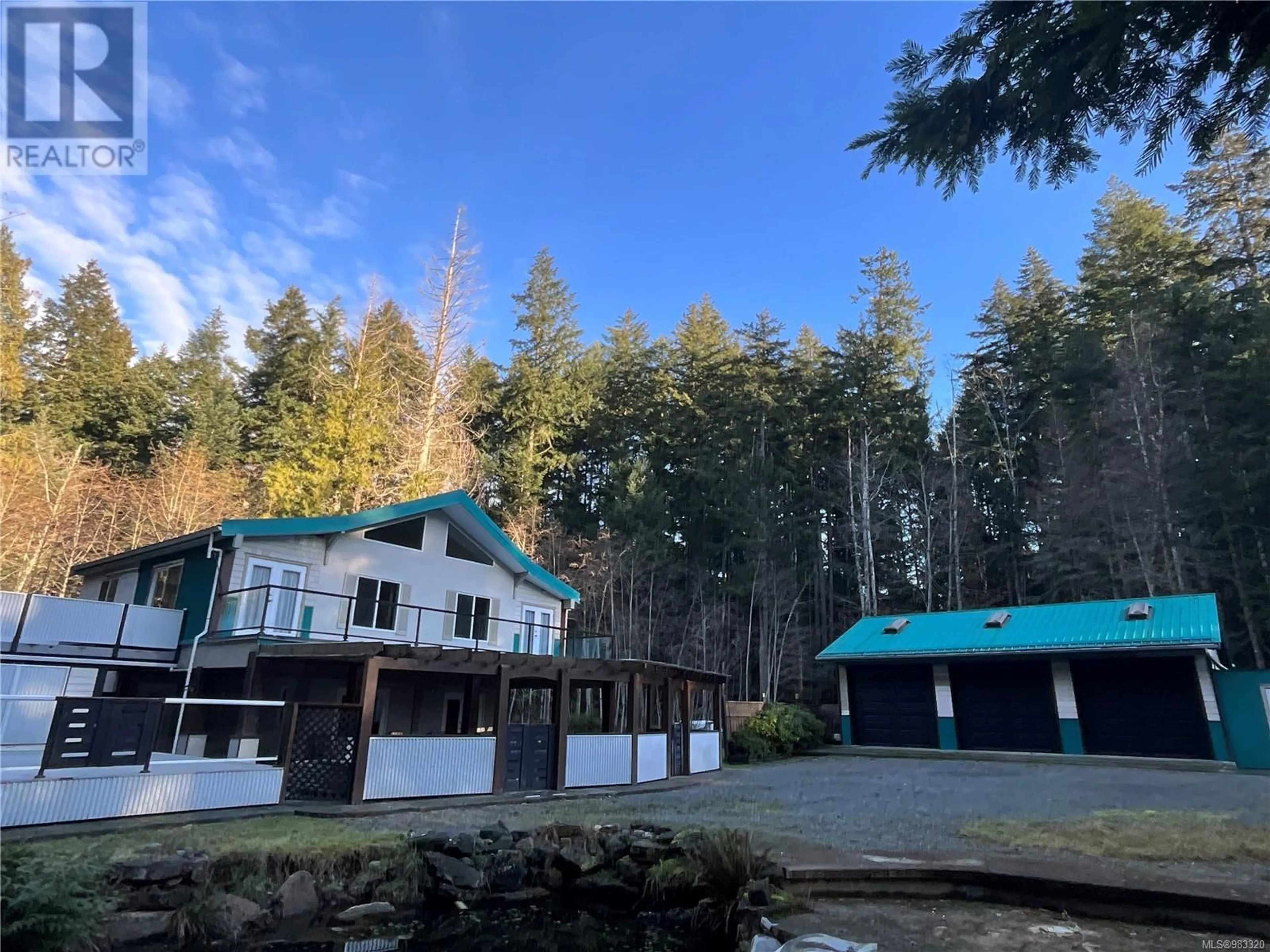 A pic from outside/outdoor area/front of a property/back of a property/a pic from drone, forest/trees view for 1445 Hess Rd, Gabriola Island British Columbia V0R1X6