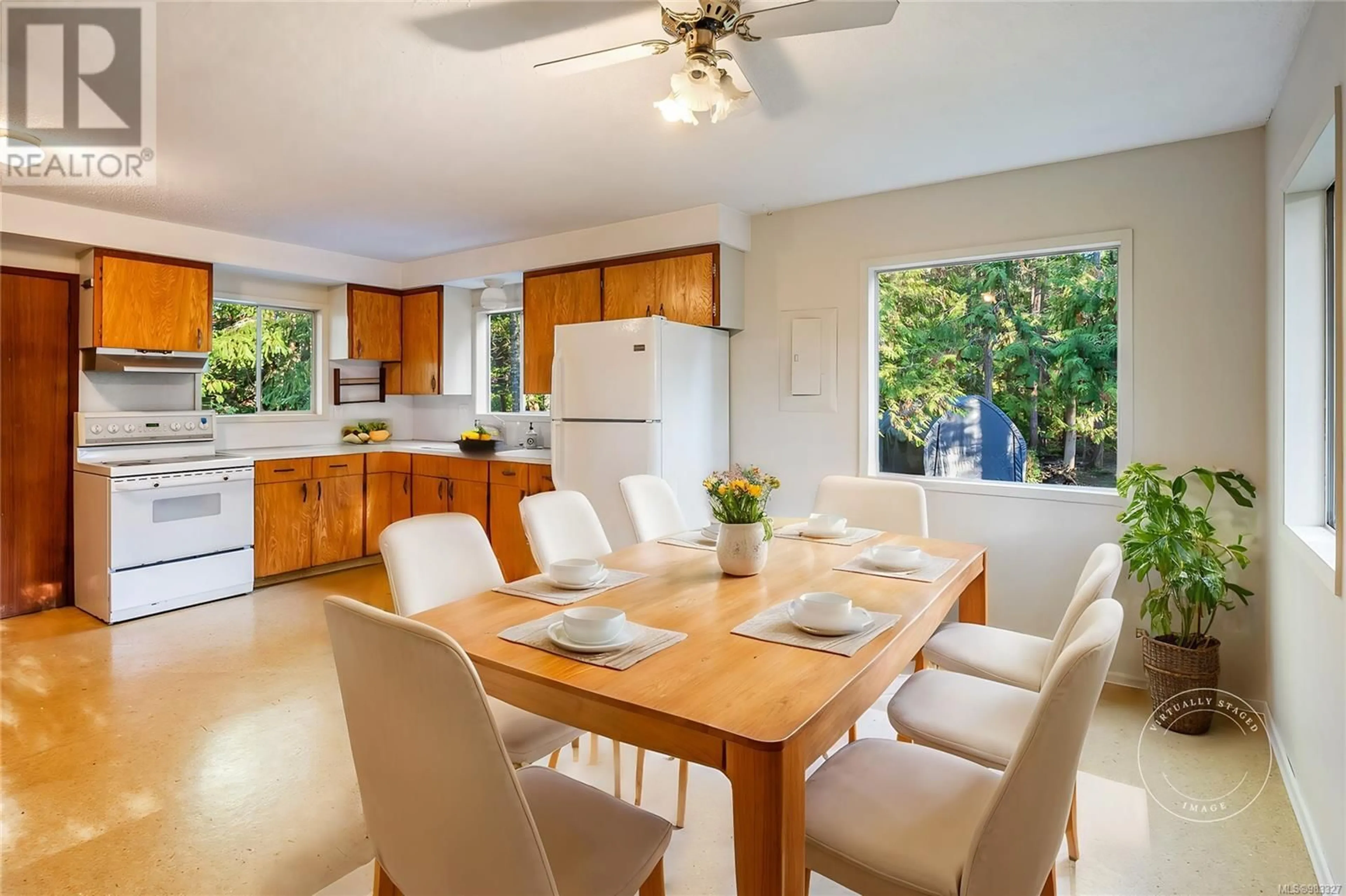 Open concept kitchen, ceramic/tile floor for 7146 Aulds Rd, Lantzville British Columbia V0R2H0