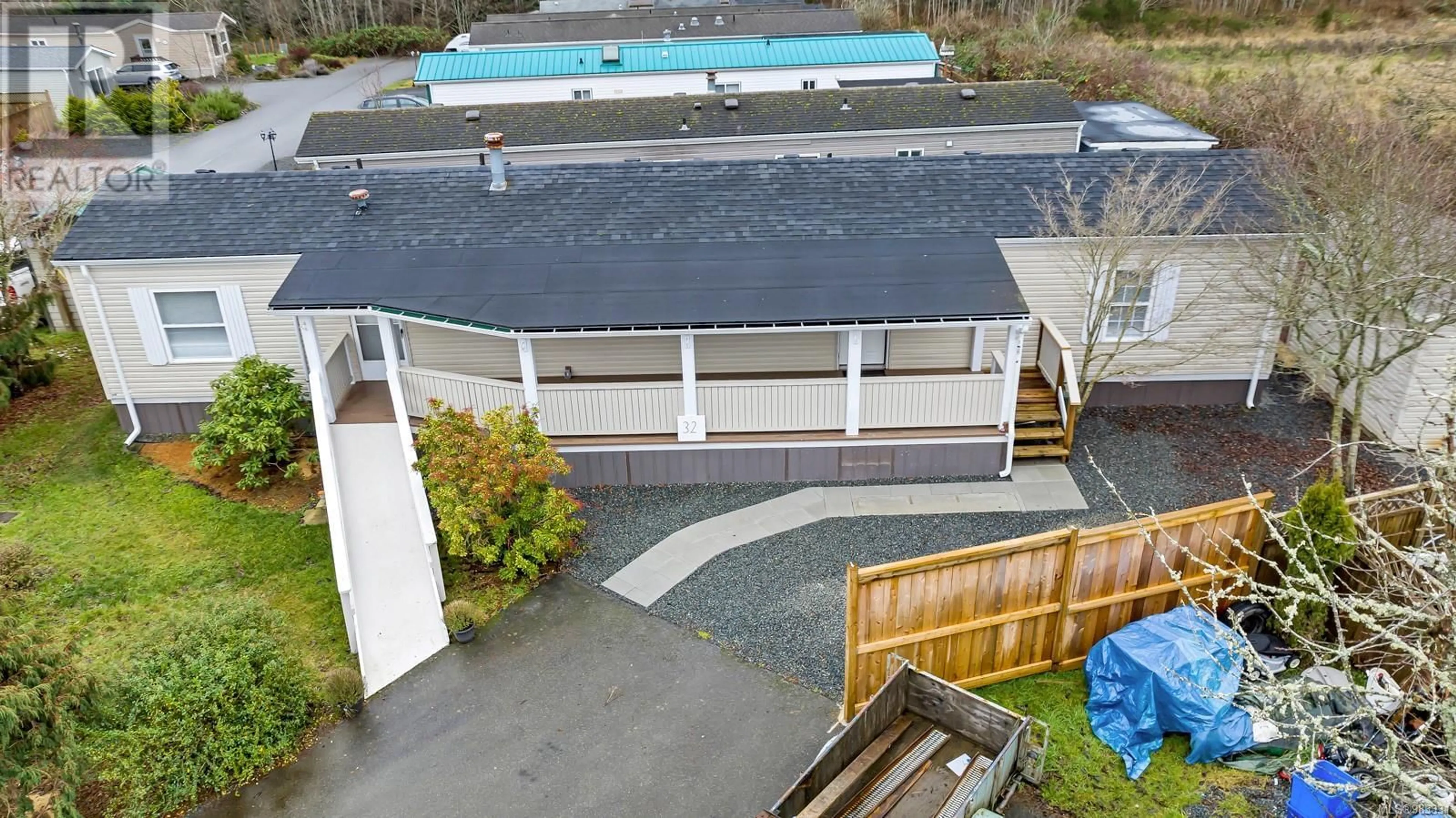 A pic from outside/outdoor area/front of a property/back of a property/a pic from drone, building for 32 7021 Grant Rd, Sooke British Columbia V9Z0N7