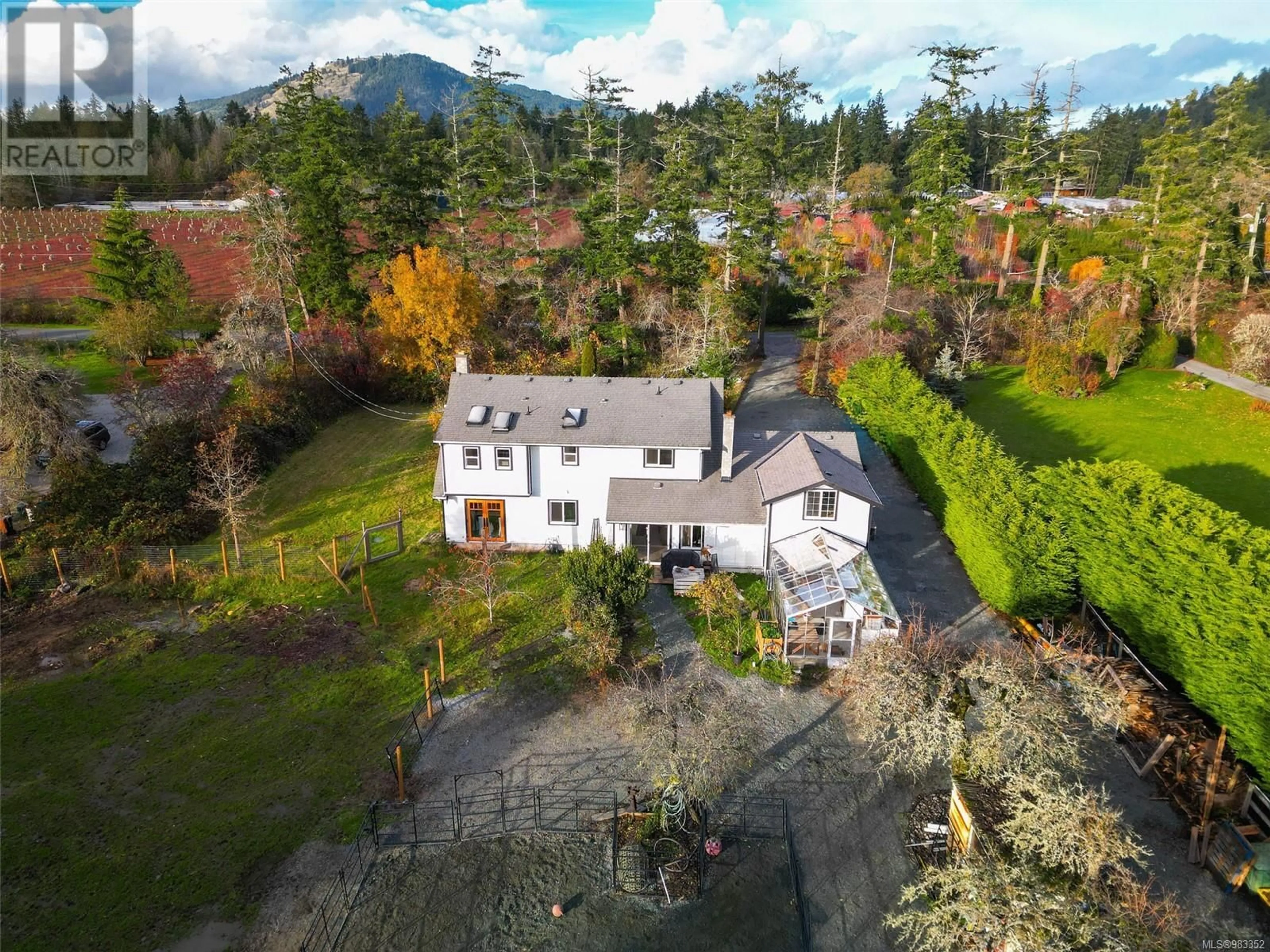 A pic from outside/outdoor area/front of a property/back of a property/a pic from drone, mountain view for 931 Clayton Rd, North Saanich British Columbia V8L5M3