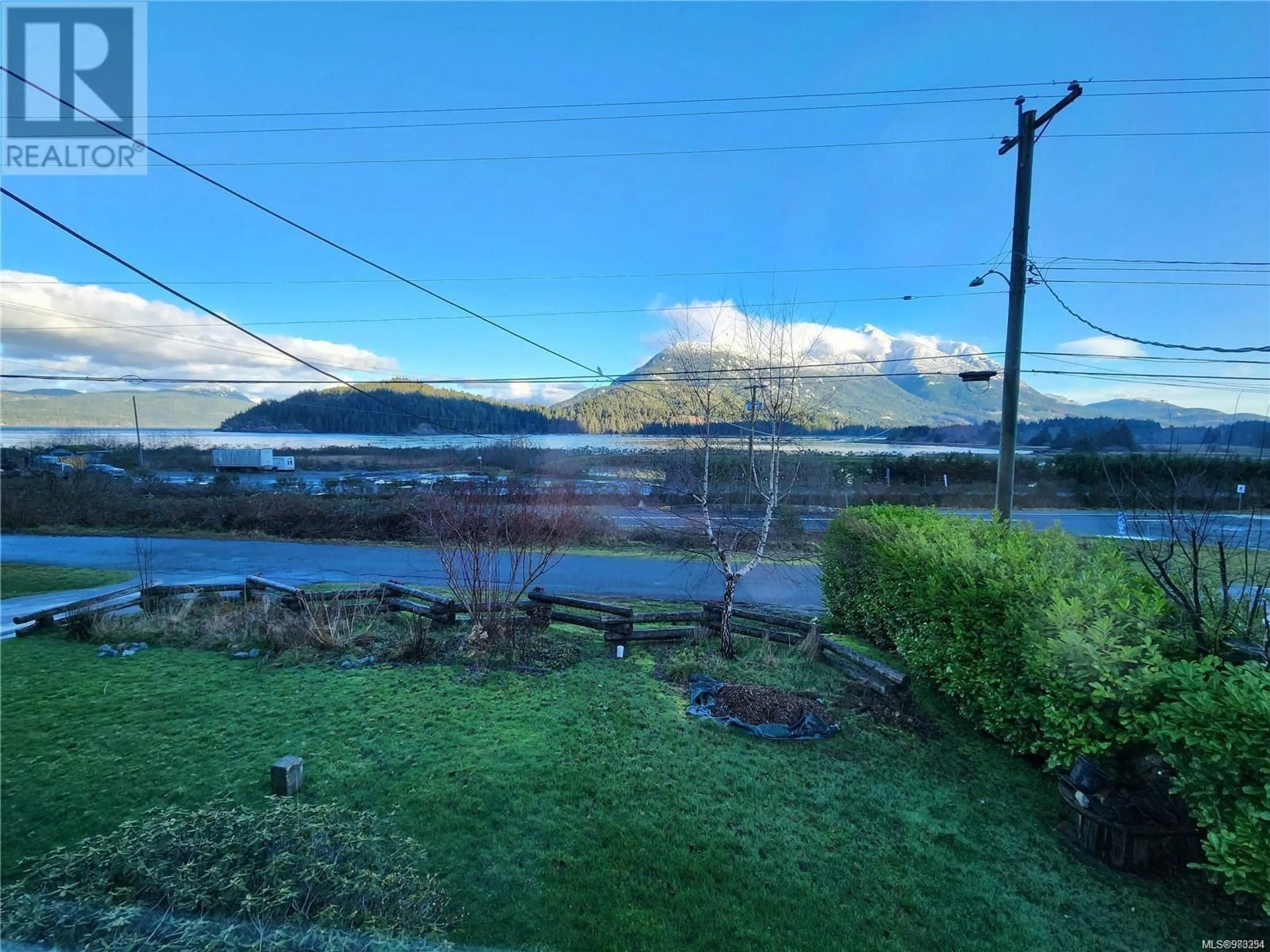 A pic from outside/outdoor area/front of a property/back of a property/a pic from drone, mountain view for 190 Kelsey Way, Sayward British Columbia V0P1R0