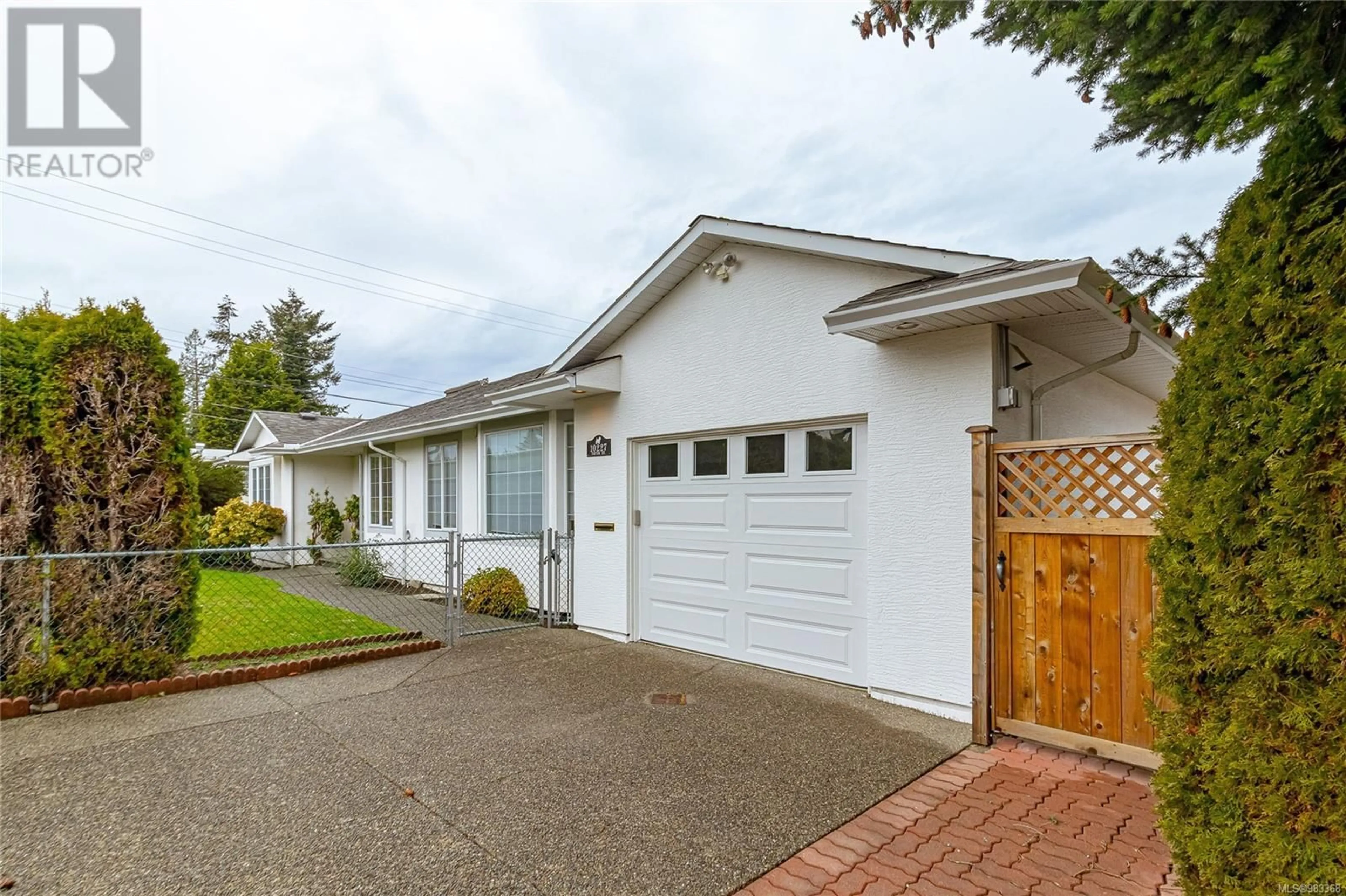 Home with vinyl exterior material, street for 10227 Fifth St, Sidney British Columbia V8L2Y4