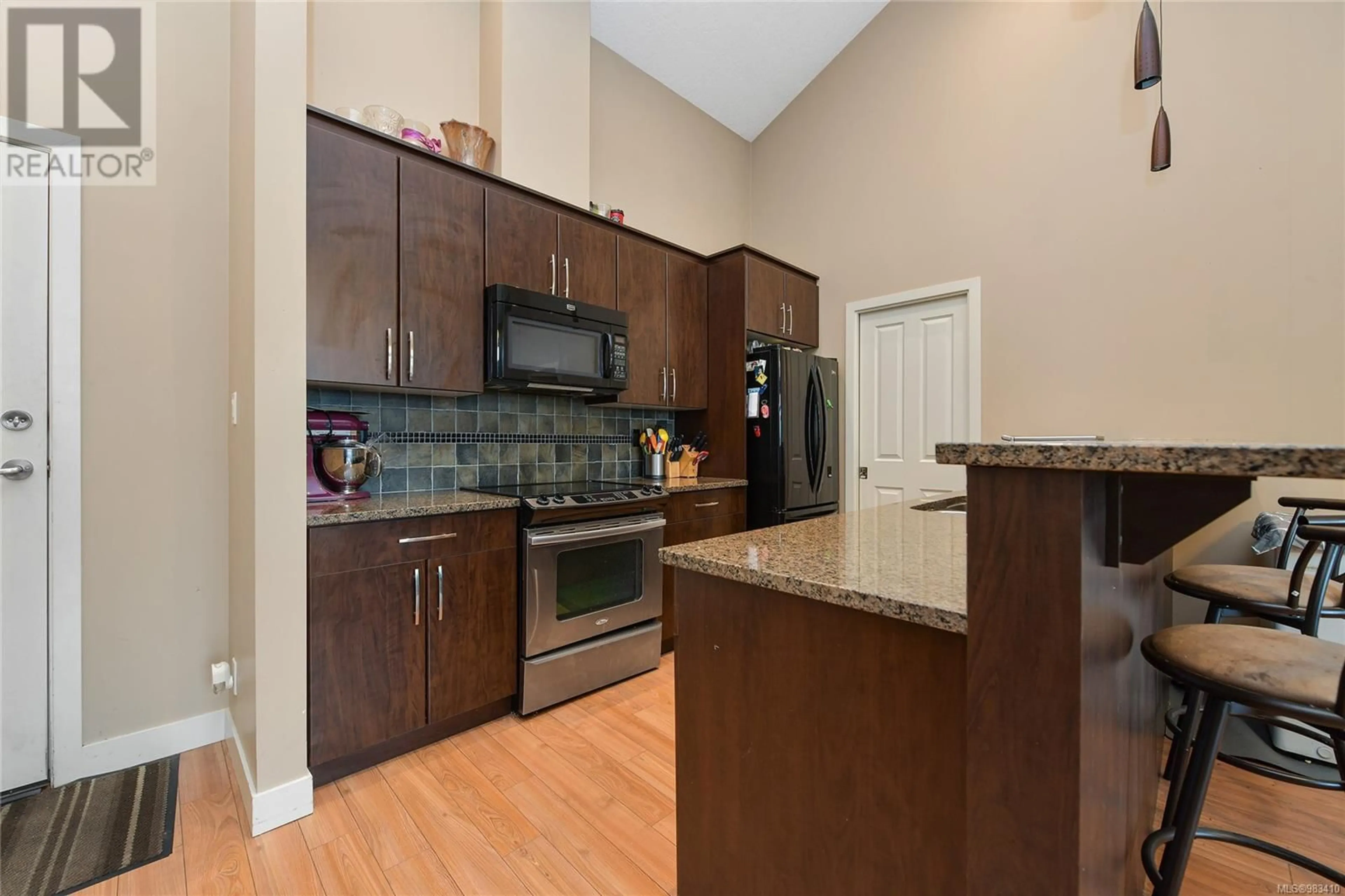 Open concept kitchen, unknown for 621 623 Treanor Ave, Langford British Columbia V9B0B1