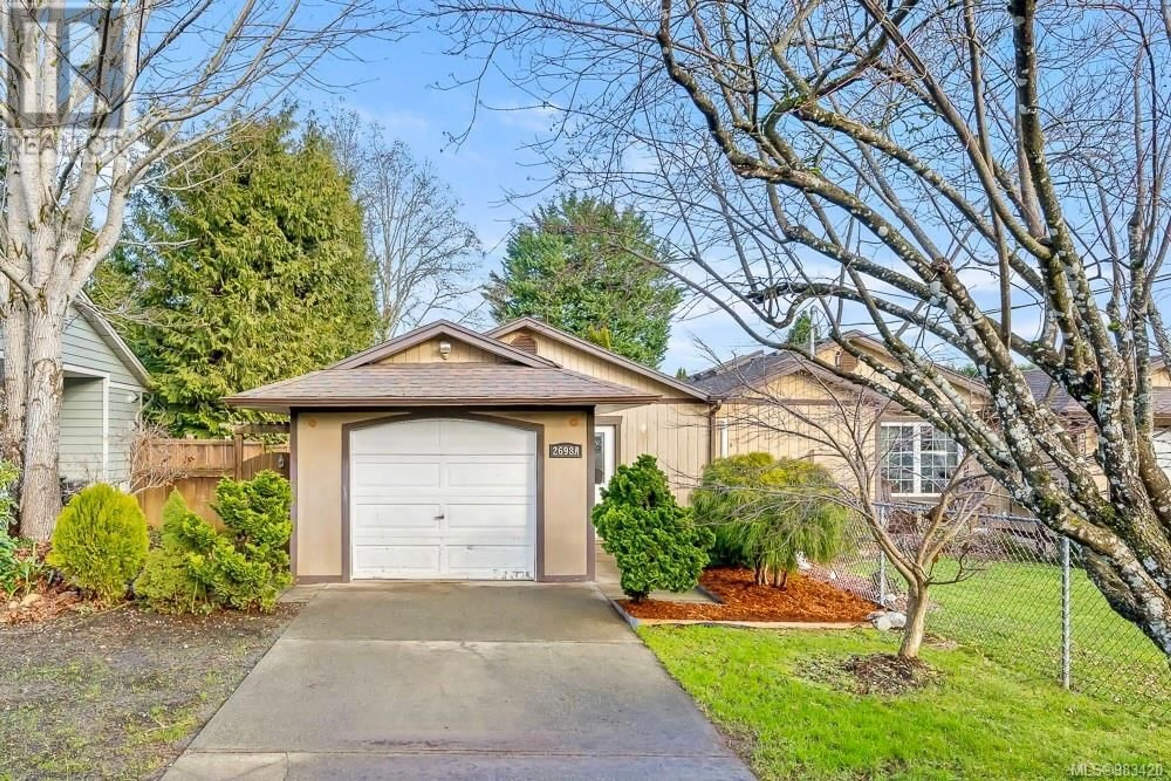 Home with vinyl exterior material, street for A 2698 Willemar Ave, Courtenay British Columbia V9N6L2