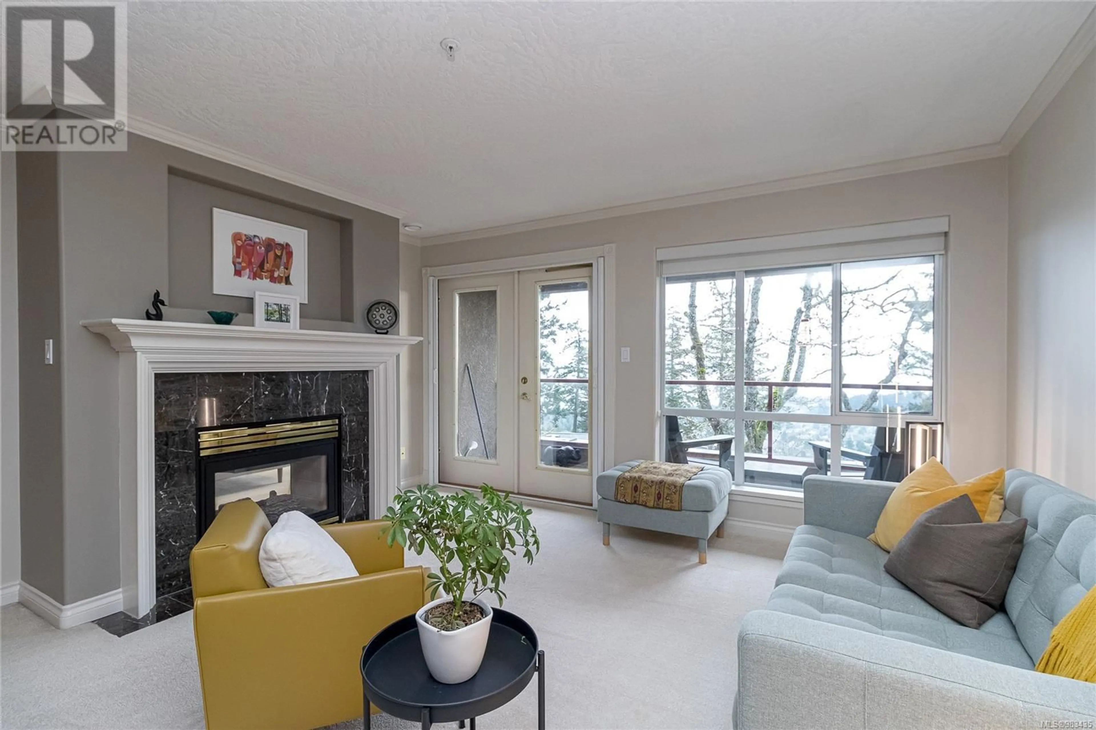 Living room with furniture, unknown for 504 940 Boulderwood Rise, Saanich British Columbia V8Y3H5