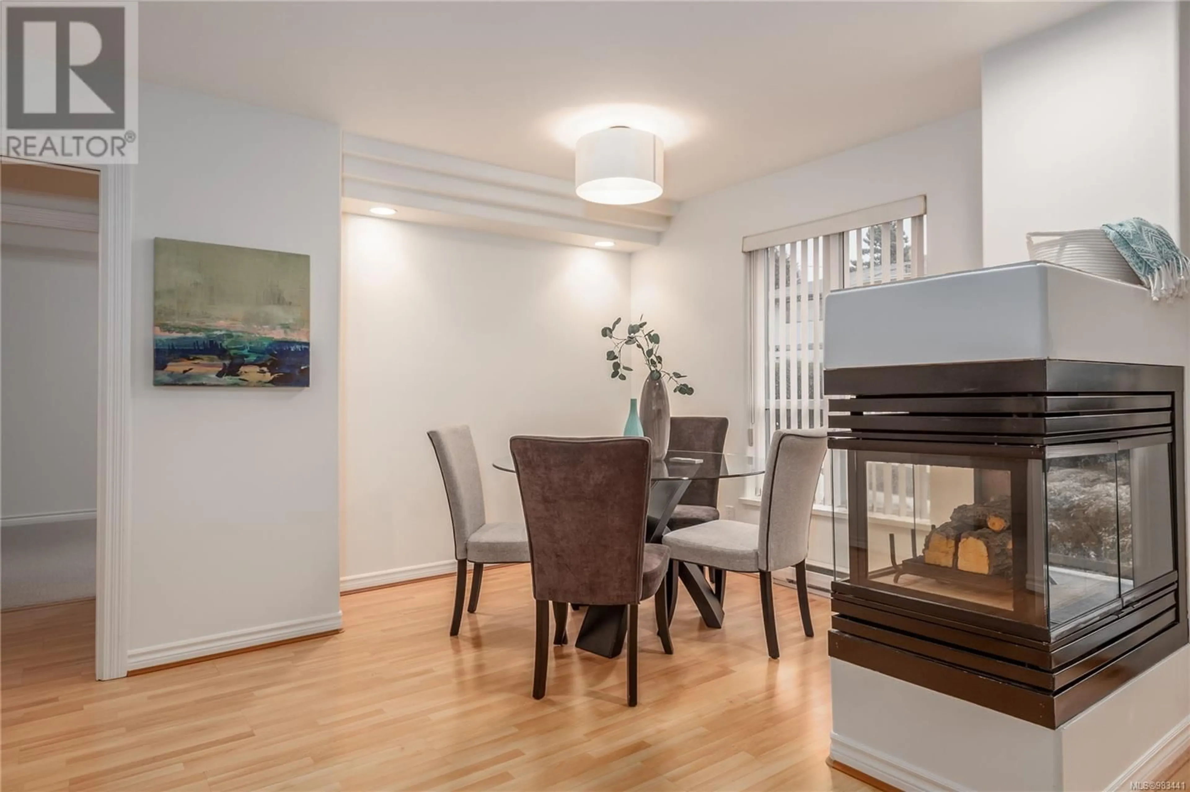 Dining room, wood/laminate floor for 204 1225 Fort St, Victoria British Columbia V8V4R2