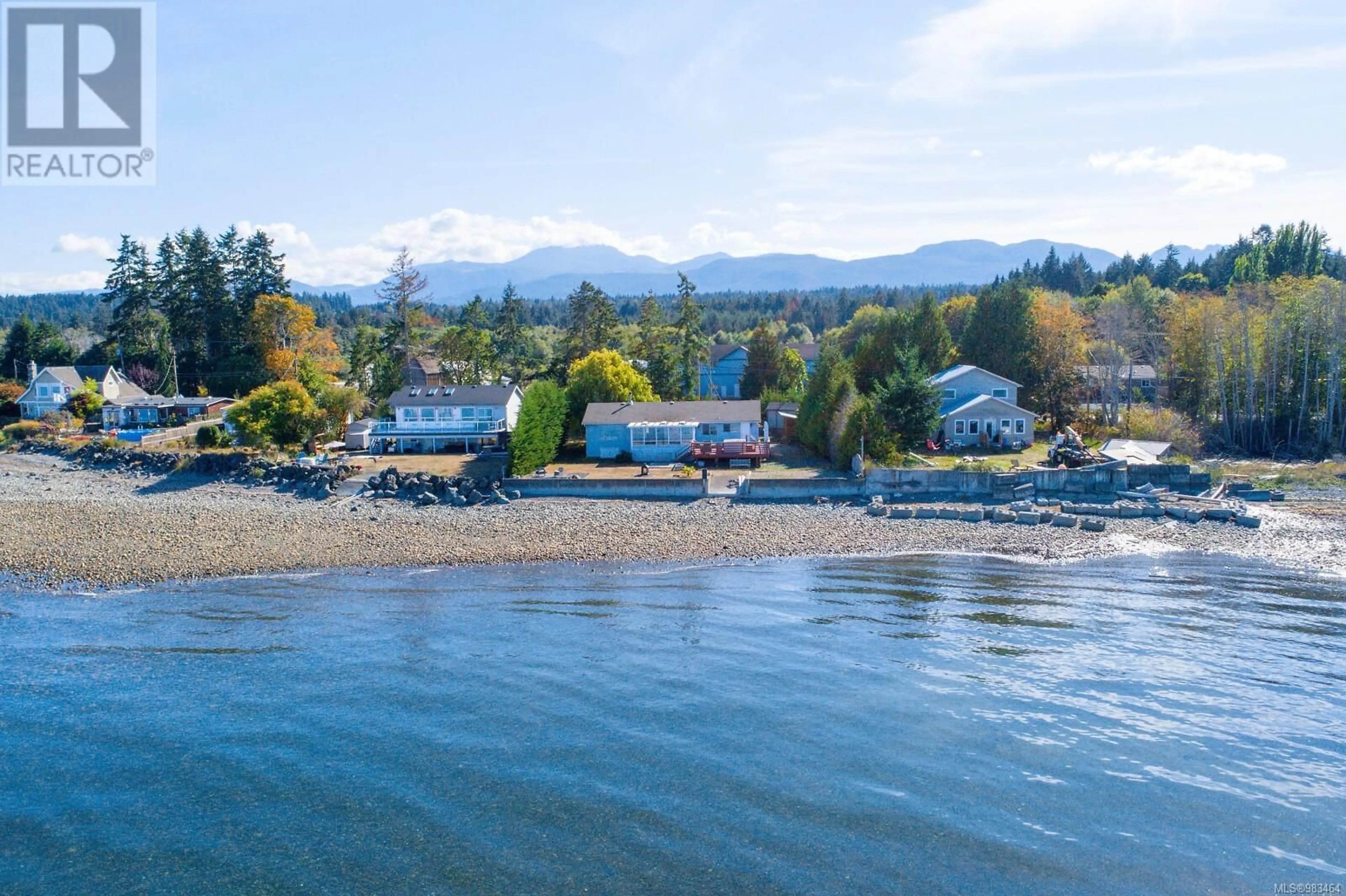 A pic from outside/outdoor area/front of a property/back of a property/a pic from drone, water/lake/river/ocean view for 5545 Island Hwy, Qualicum Beach British Columbia V9K2C8