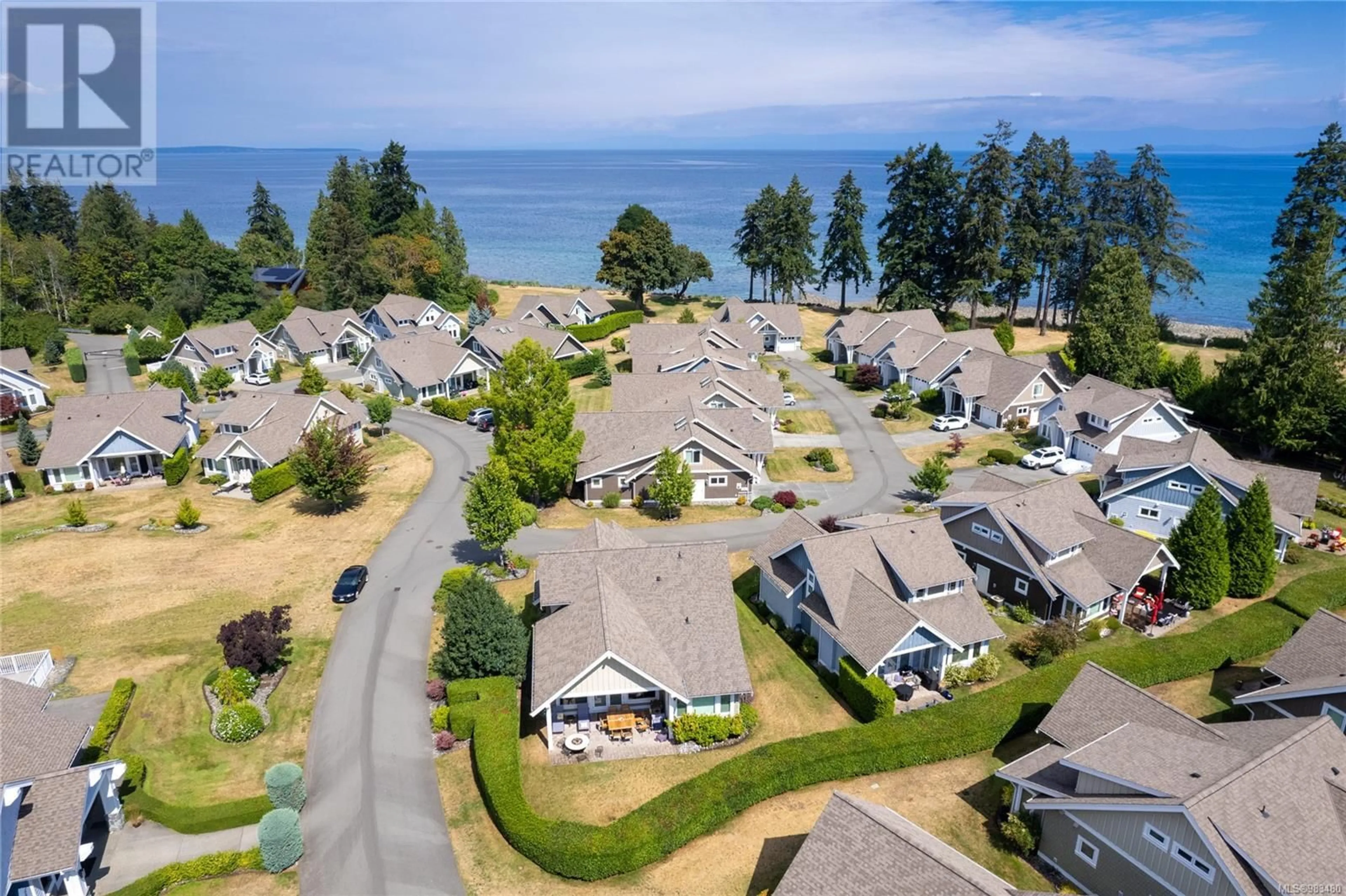 A pic from outside/outdoor area/front of a property/back of a property/a pic from drone, water/lake/river/ocean view for 45 5251 Island Hwy W, Qualicum Beach British Columbia V9K2C1