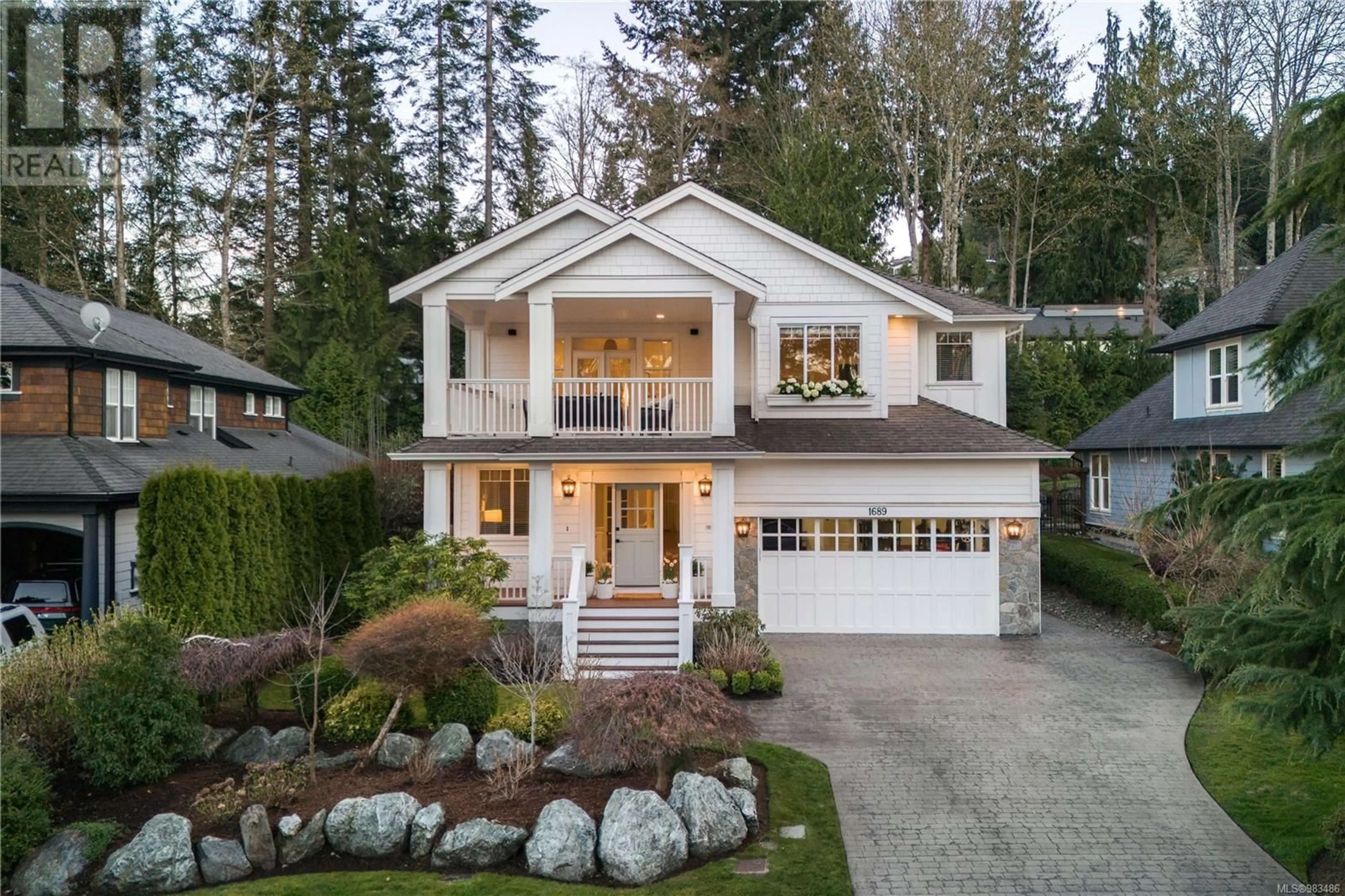 Home with vinyl exterior material, street for 1689 Texada Terr, North Saanich British Columbia V8L6B1