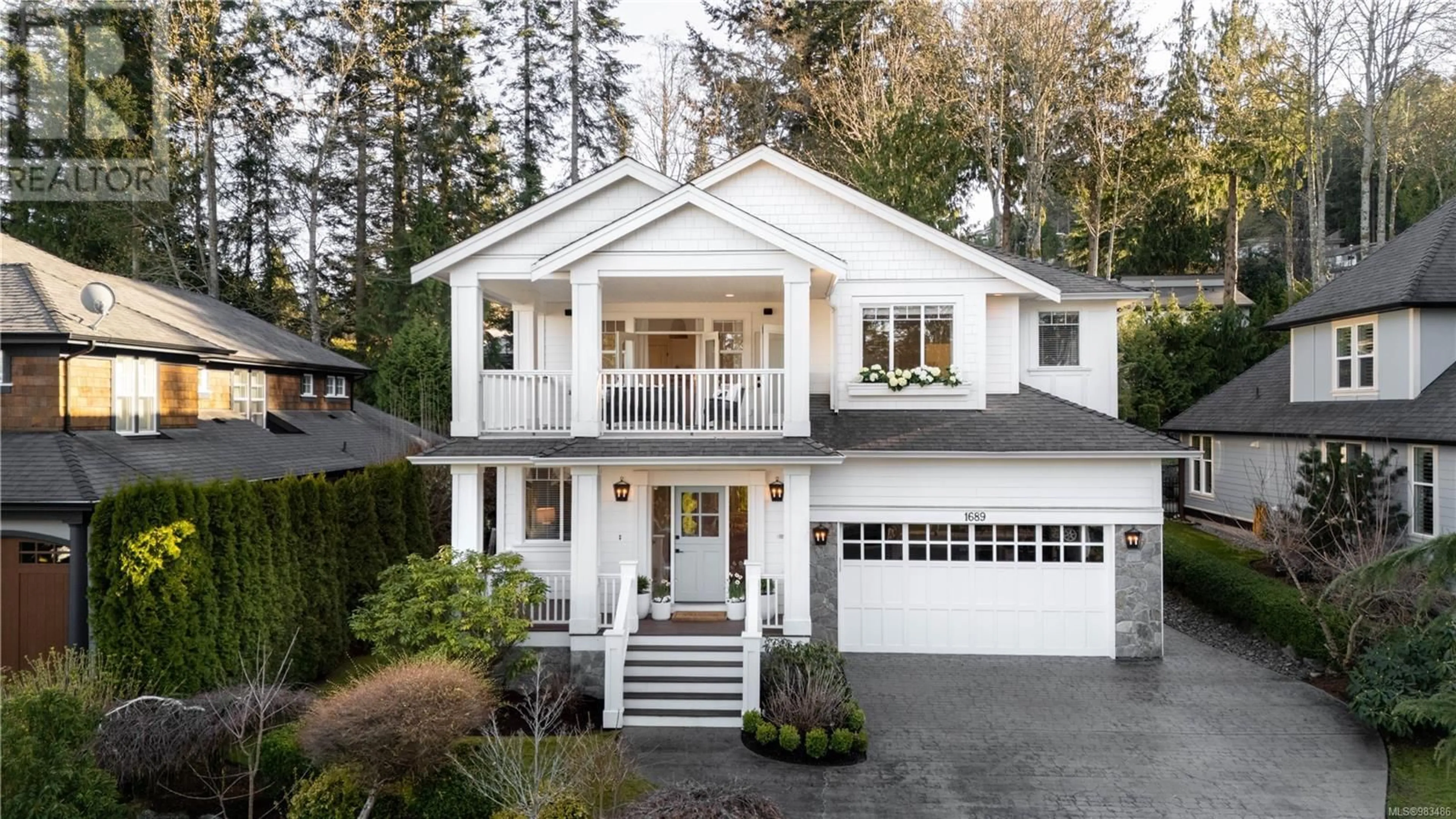 Home with vinyl exterior material, street for 1689 Texada Terr, North Saanich British Columbia V8L6B1