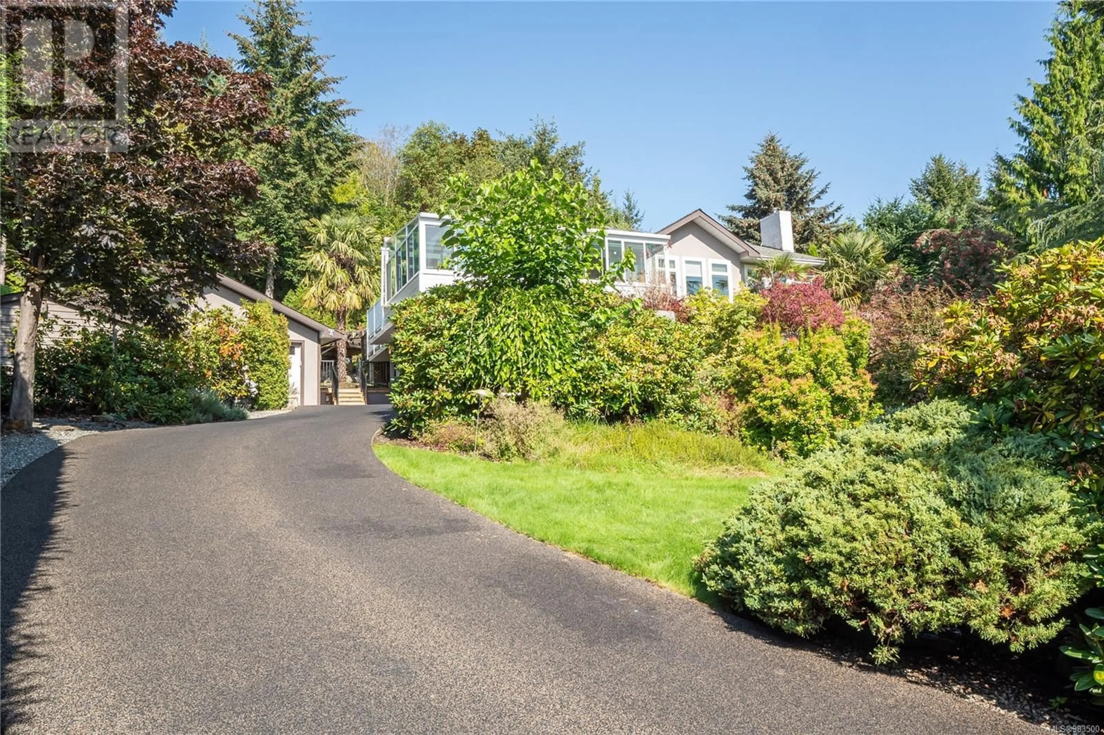 A pic from outside/outdoor area/front of a property/back of a property/a pic from drone, street for 11074 Larkspur Lane, North Saanich British Columbia V8L5N6