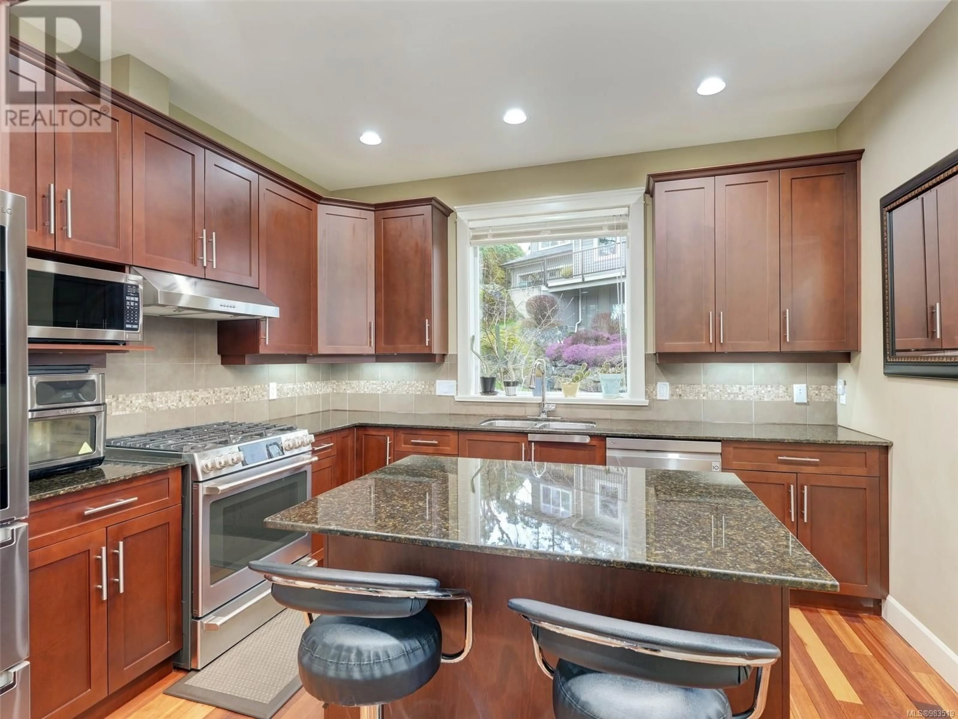 Open concept kitchen, ceramic/tile floor for 21 551 Bezanton Way, Colwood British Columbia V9C0C5