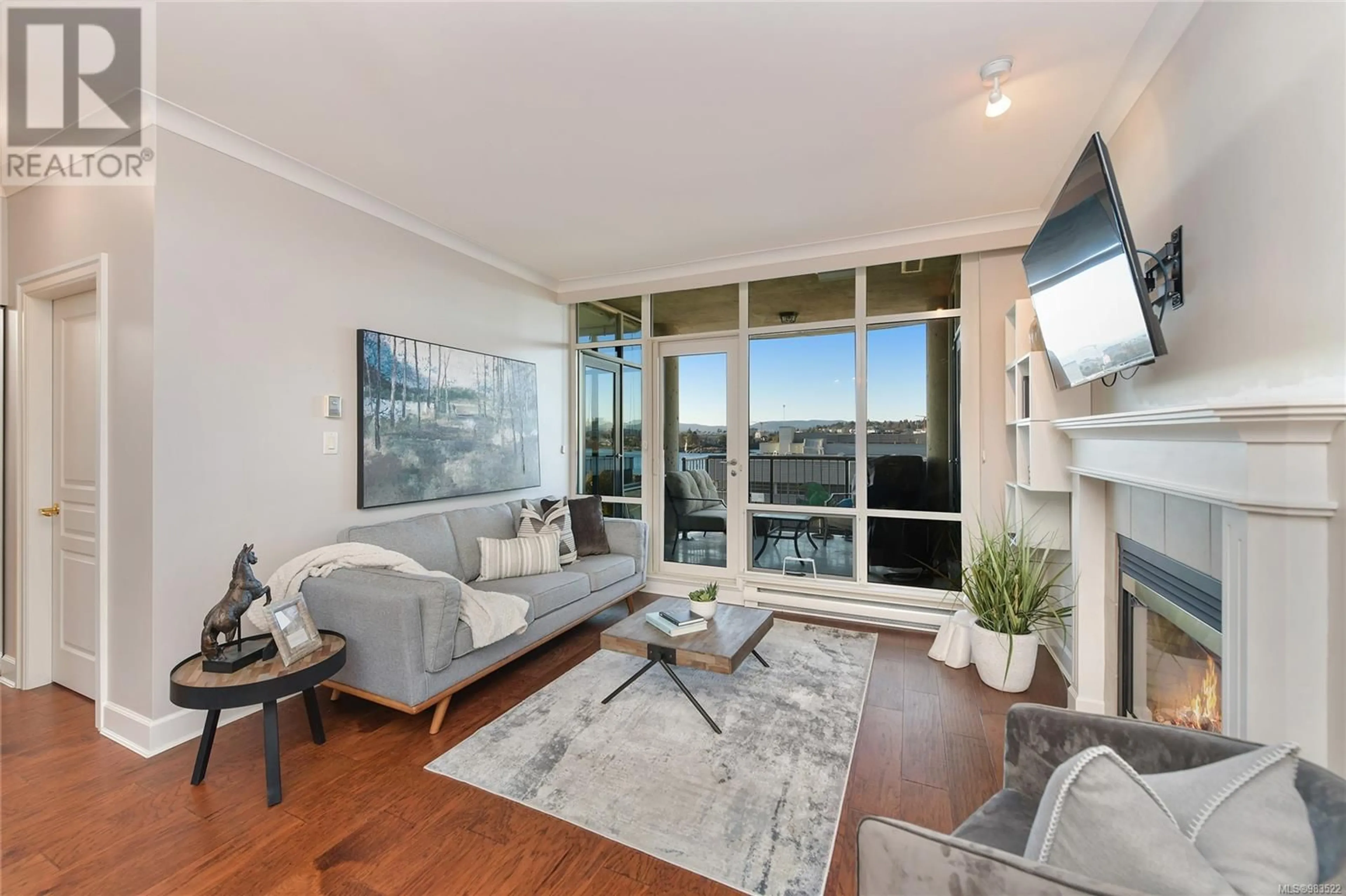 Living room with furniture, wood/laminate floor for 508 21 Dallas Rd, Victoria British Columbia V8V4Z9