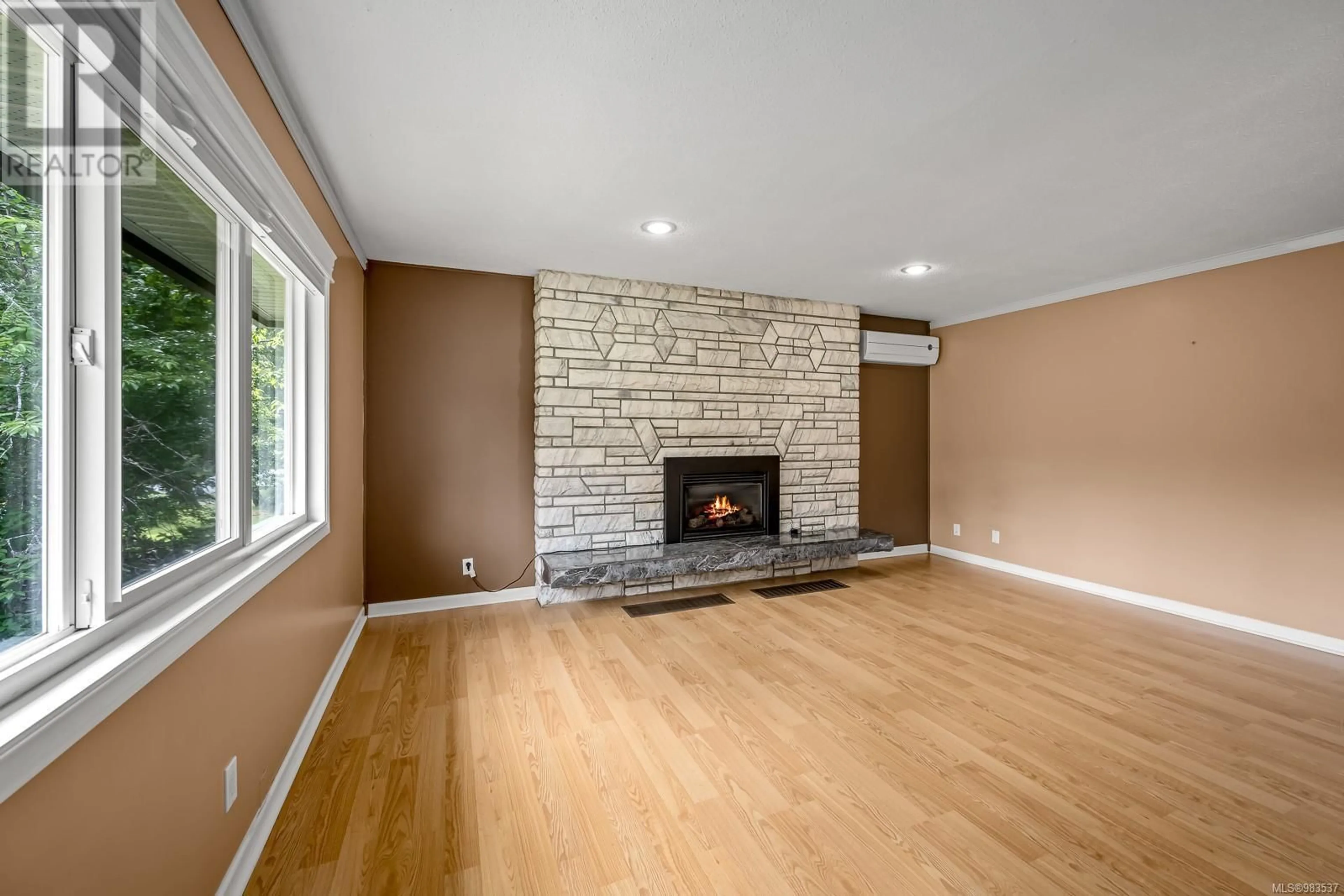 Living room with furniture, wood/laminate floor for 6796 Beaver Creek Rd, Port Alberni British Columbia V9Y8M2