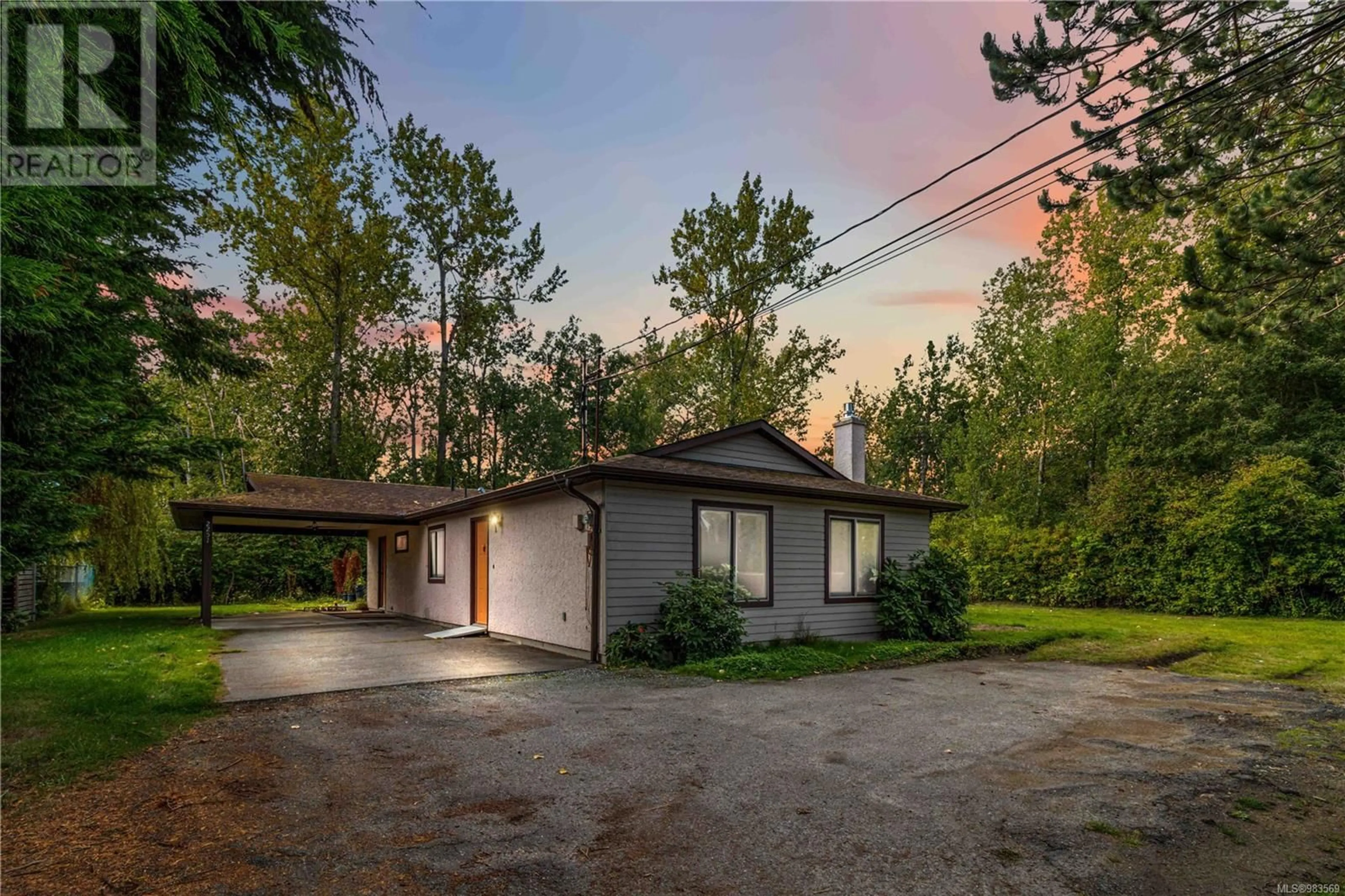 A pic from outside/outdoor area/front of a property/back of a property/a pic from drone, street for 2251 Weiler Ave, Sidney British Columbia V8L1R7