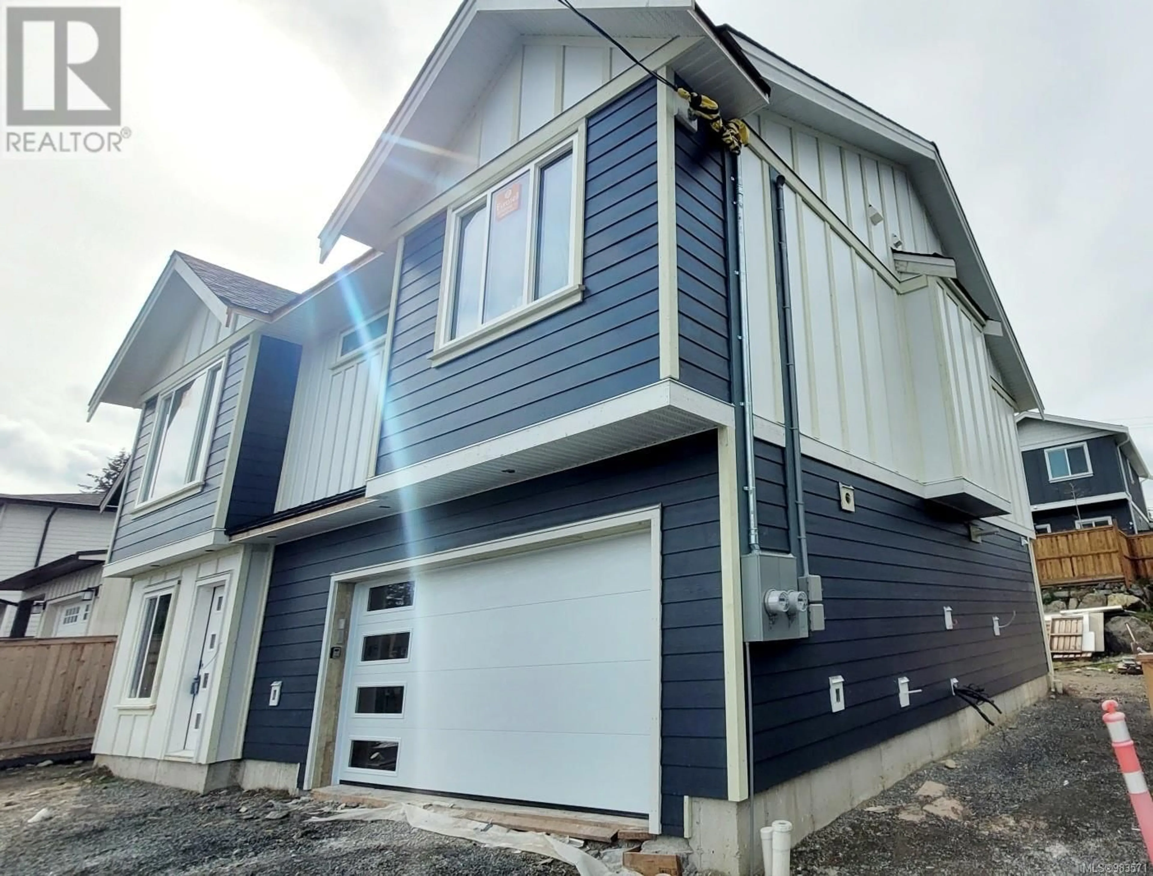 Home with vinyl exterior material, street for 7072 CENTRAL SAANICH ROAD, Central Saanich British Columbia V8M1Y3