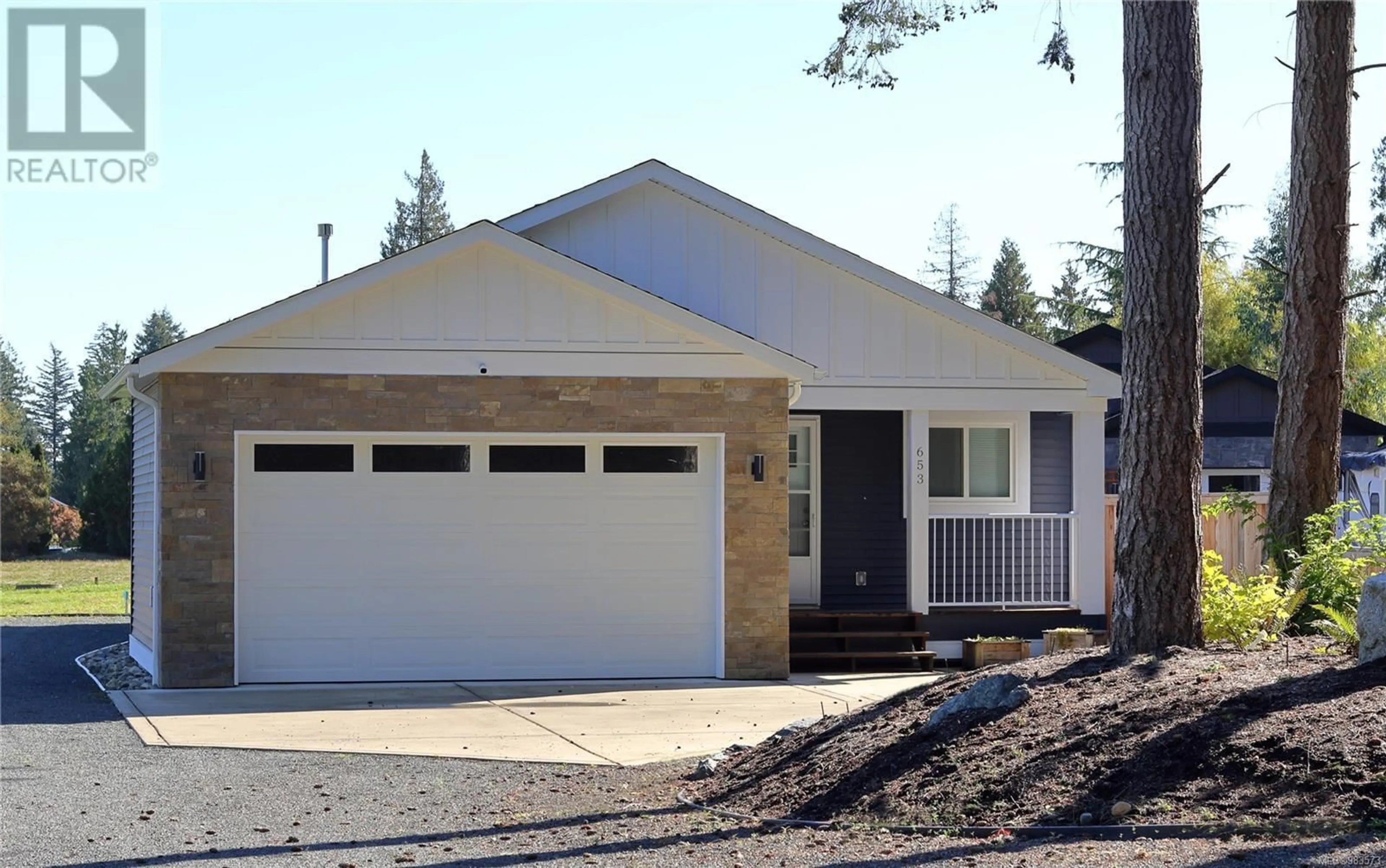 Home with vinyl exterior material, street for 653 Yambury Rd, Qualicum Beach British Columbia V9K1C5