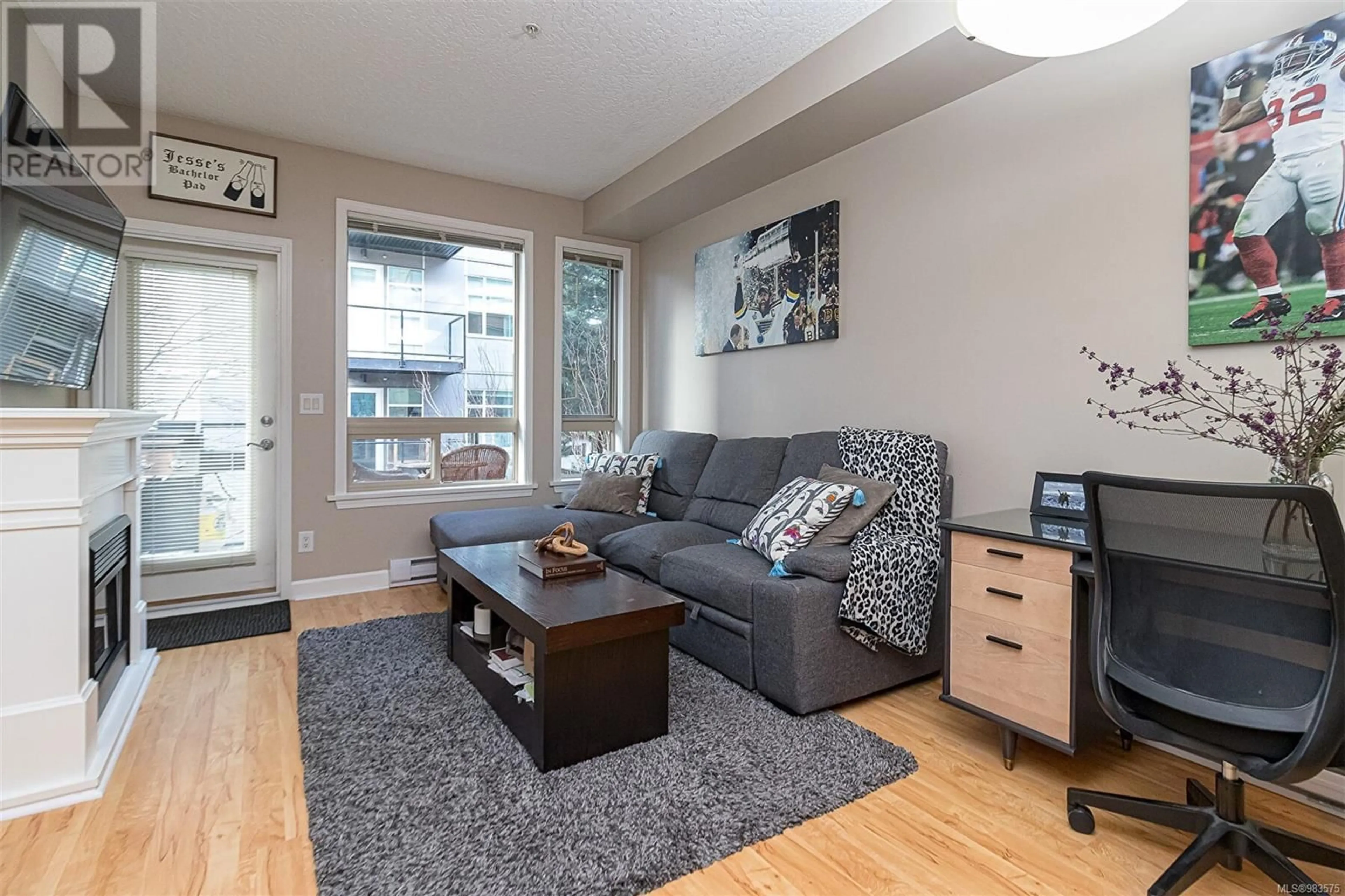 Living room with furniture, wood/laminate floor for 207 825 Goldstream Ave, Langford British Columbia V9B0C3