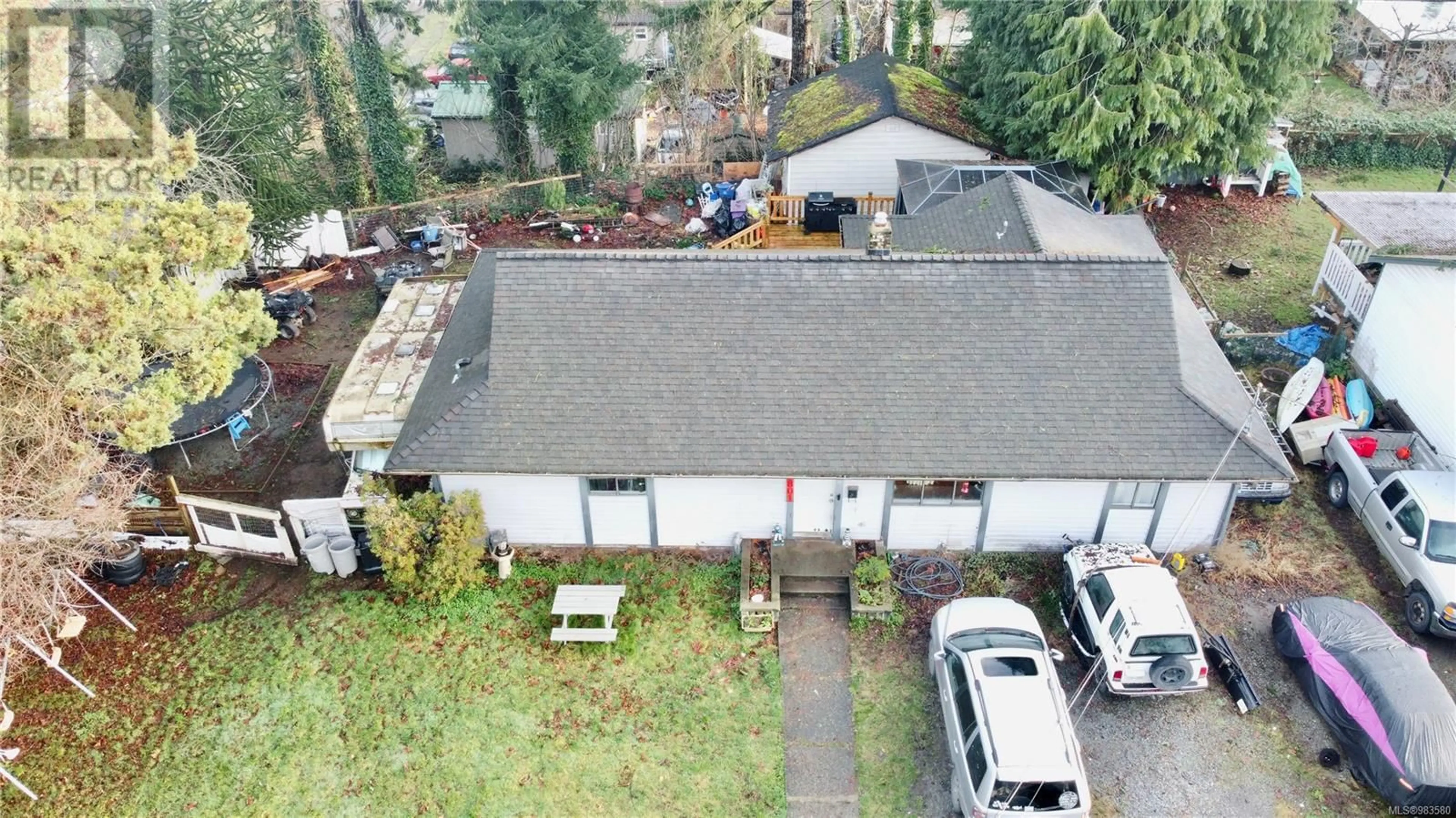 A pic from outside/outdoor area/front of a property/back of a property/a pic from drone, street for 2801 Vargo Rd, Campbell River British Columbia V9W4W9