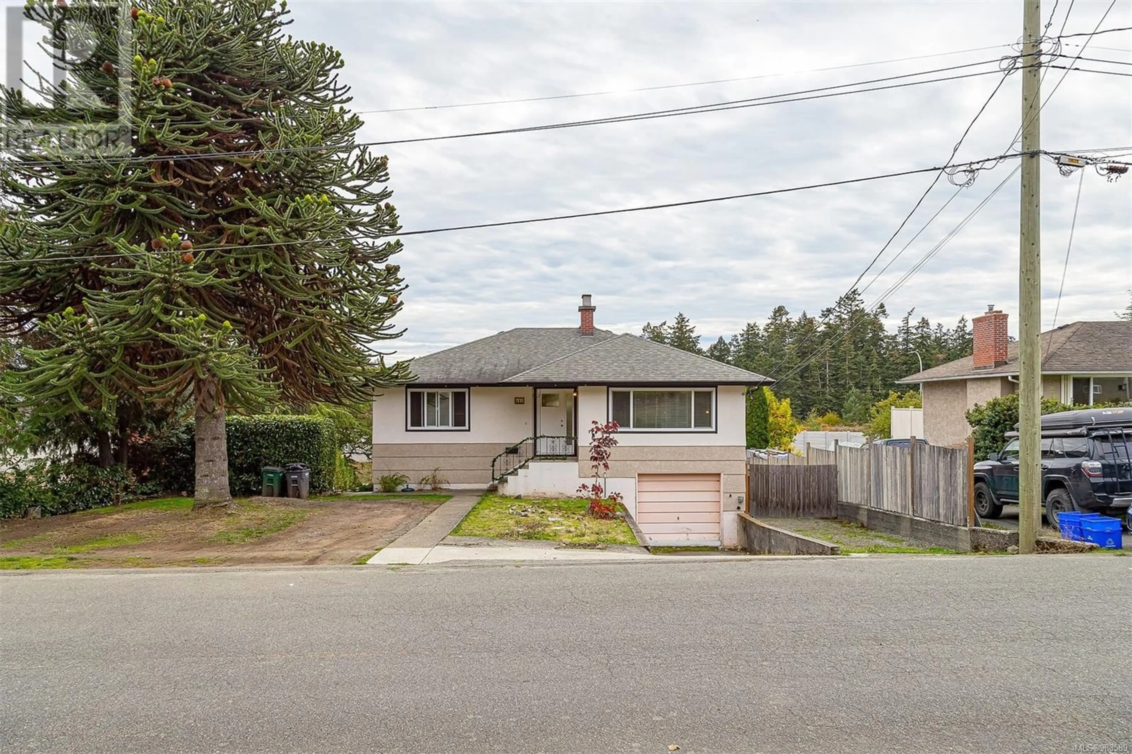 A pic from outside/outdoor area/front of a property/back of a property/a pic from drone, street for 617 Sedger Rd, Saanich British Columbia V8Z1R9