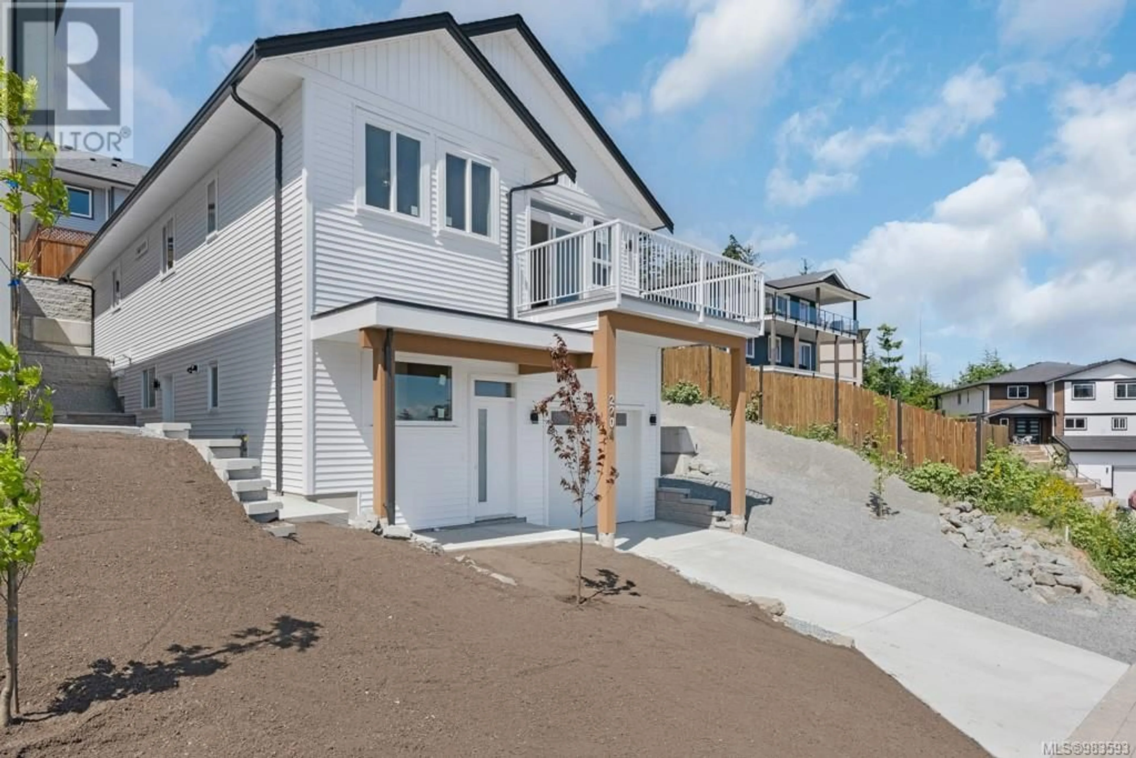 Home with vinyl exterior material, street for 2204 Dodds Rd, Nanaimo British Columbia V9X1A1