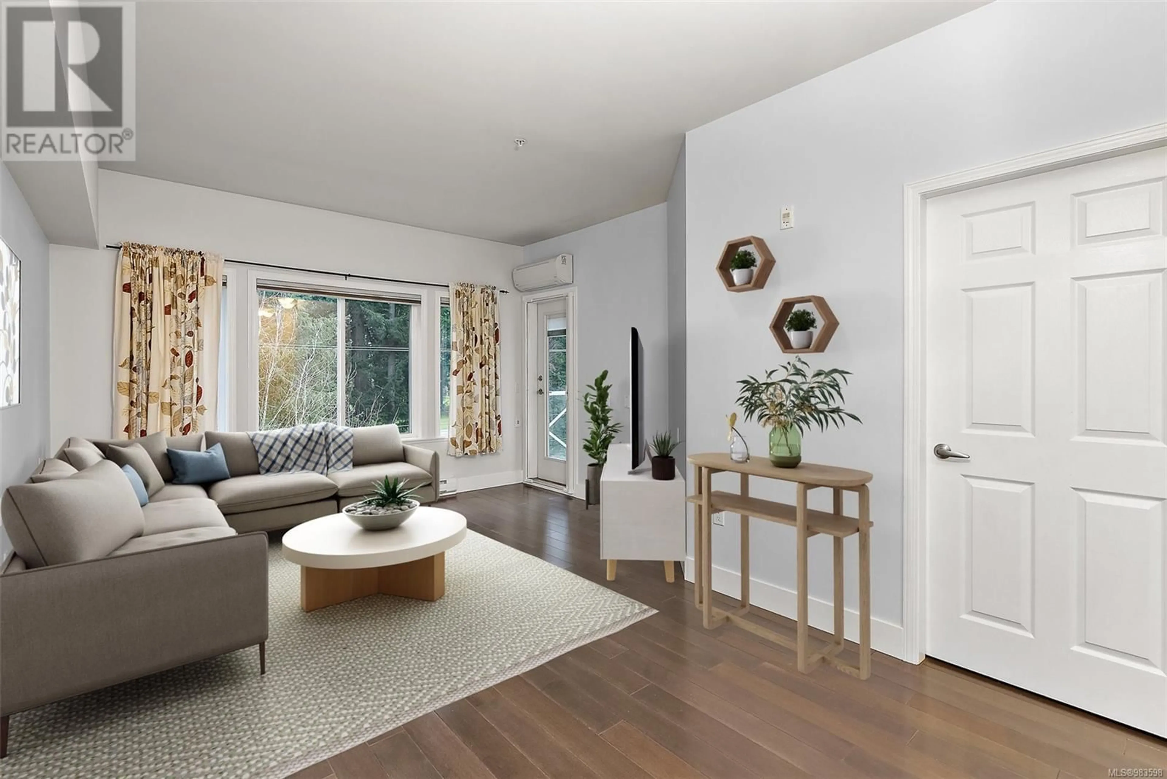 Living room with furniture, wood/laminate floor for 403 360 Goldstream Ave, Colwood British Columbia V9B2W3