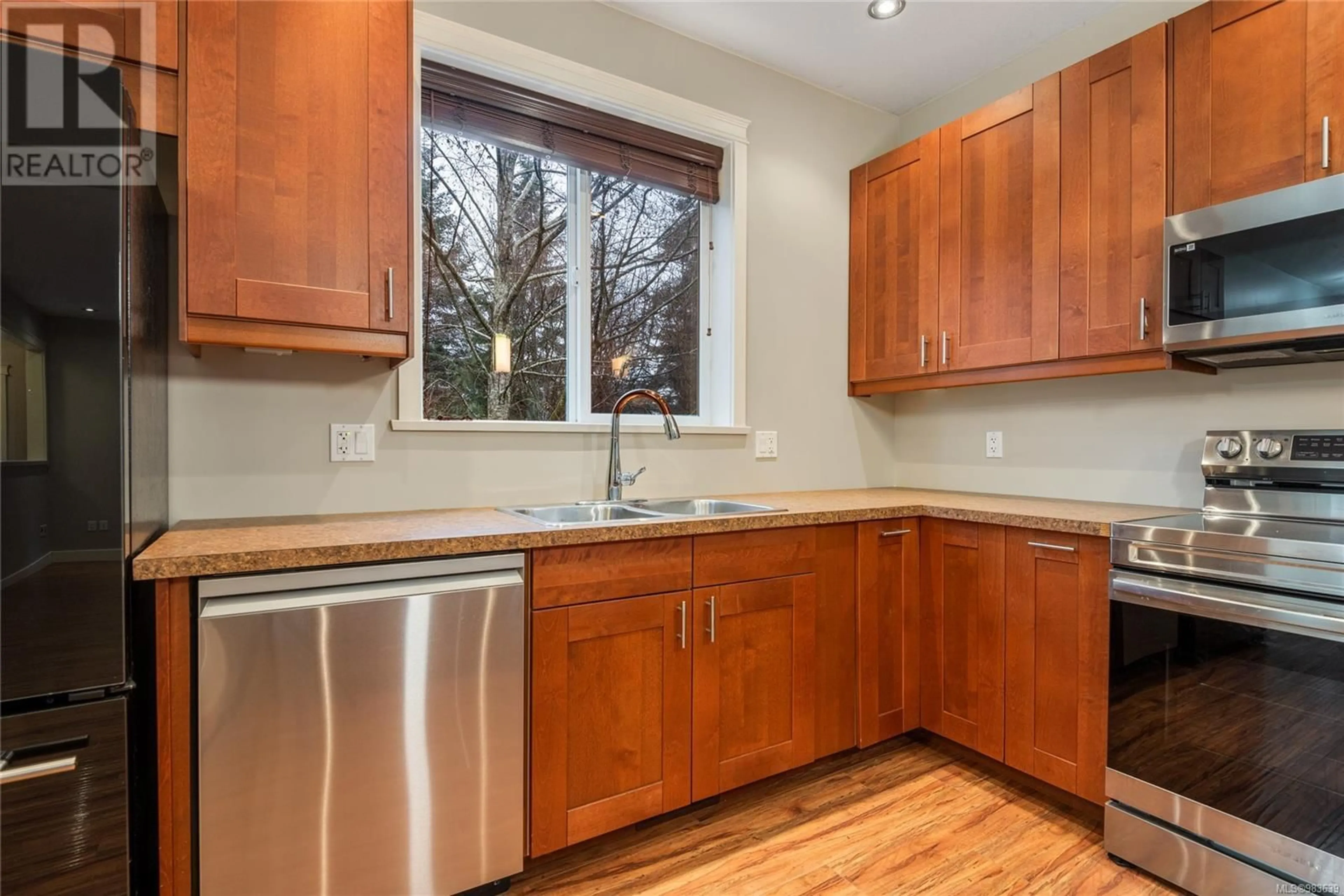 Standard kitchen, wood/laminate floor for 2746 Bradford Dr, Campbell River British Columbia V9W0A3