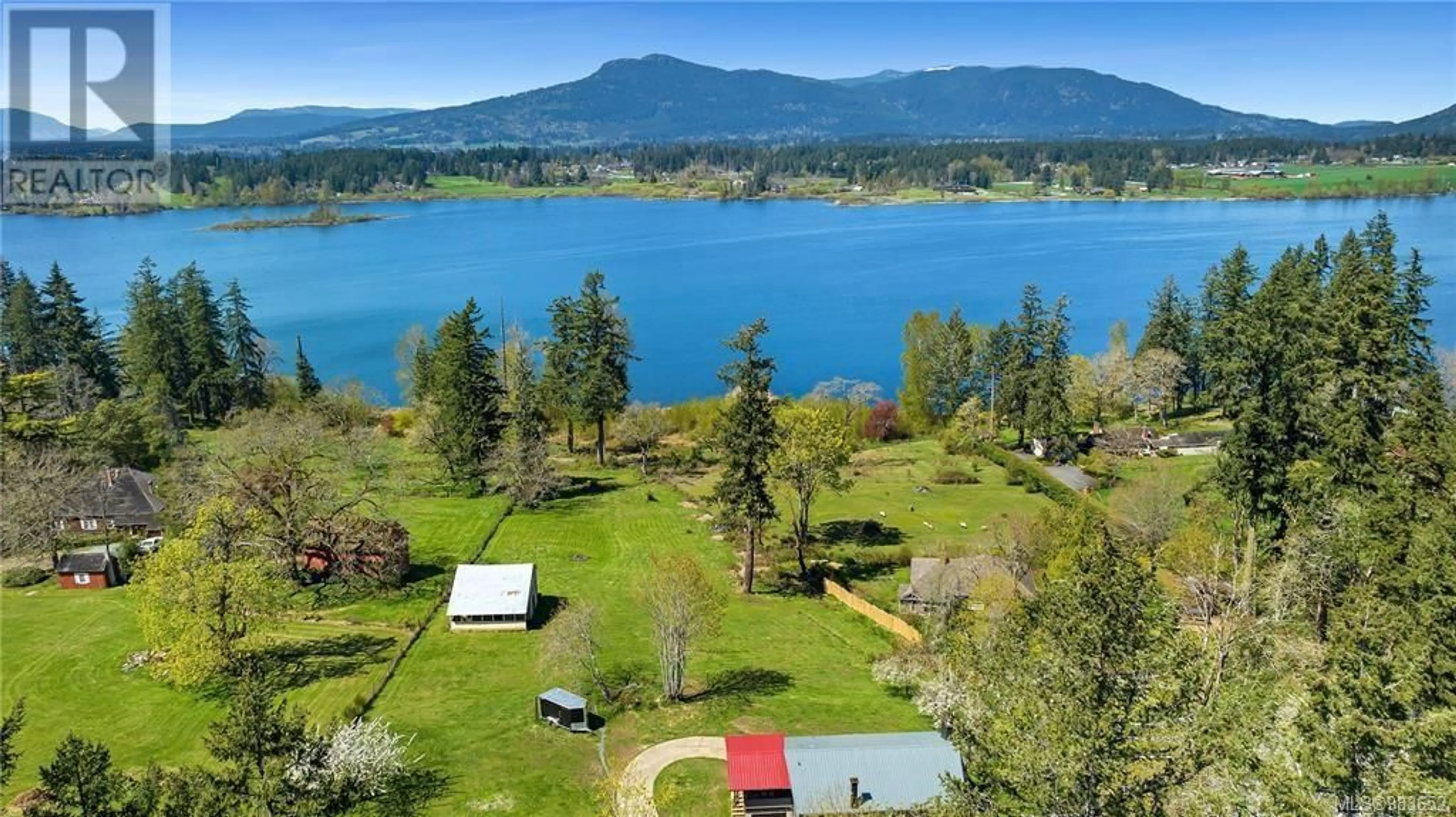 A pic from outside/outdoor area/front of a property/back of a property/a pic from drone, water/lake/river/ocean view for 1743 Maple Bay Rd, Duncan British Columbia V9L5N6