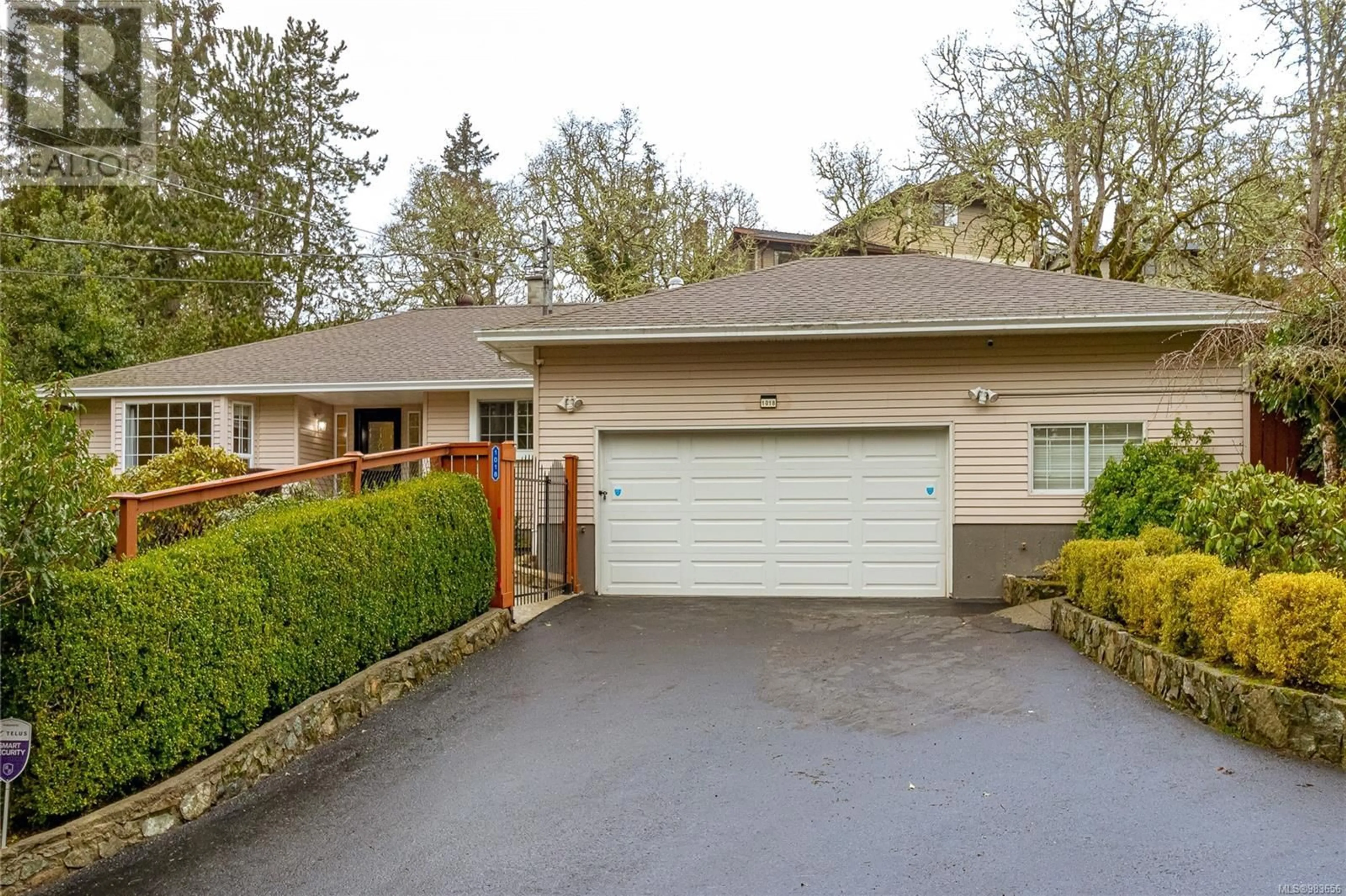 Home with vinyl exterior material, street for 1018 Benvenuto Ave, Central Saanich British Columbia V8M1A1